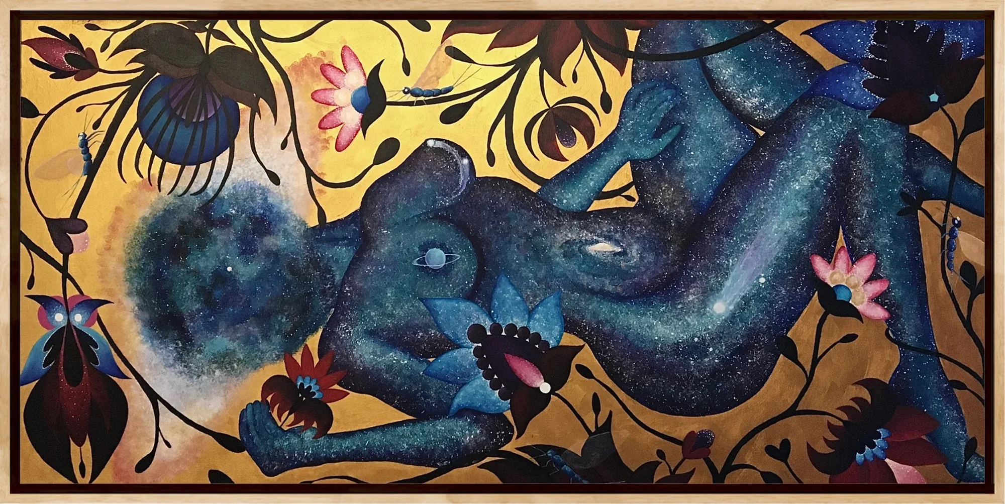 A colorful painting of a sleeping woman with a galaxy pattern on her skin, surrounded by black vines, flowers, and insects, set against a gold background.