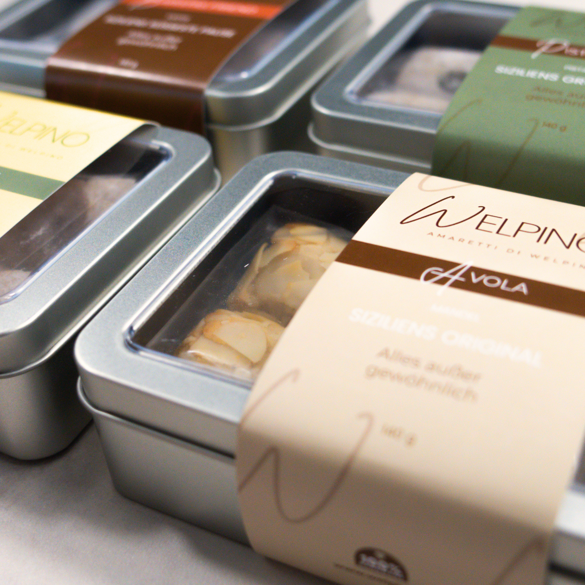 Welpino Amaretti 4er-Boxen in verschiedenen Sorten verpackt