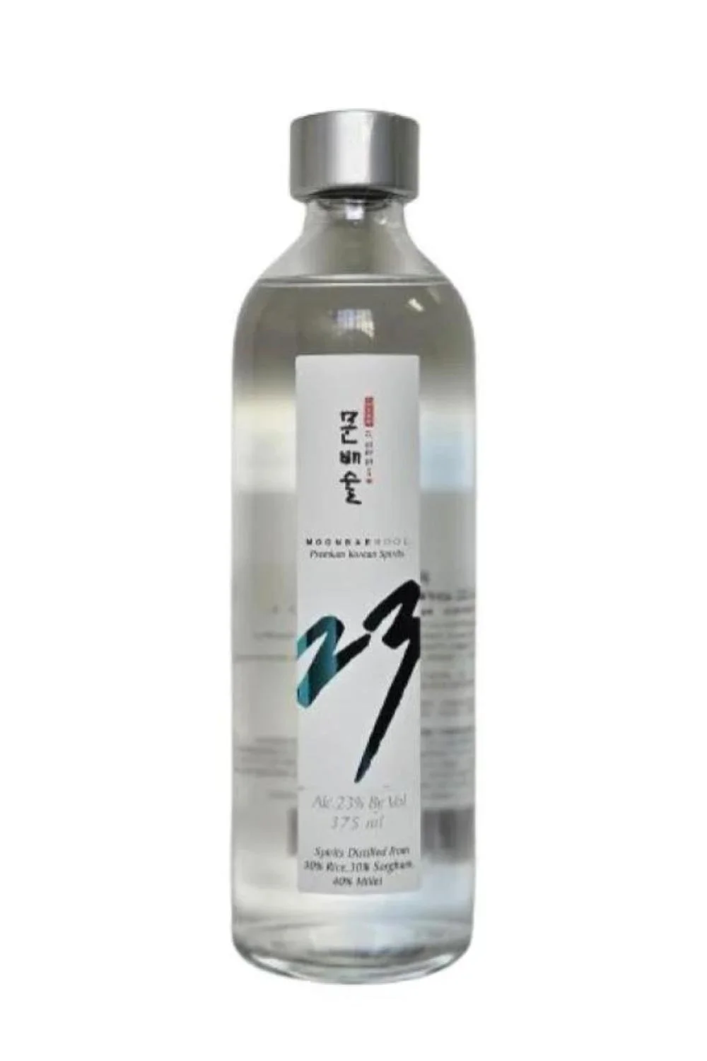 A clear bottle of spirit with a white label and metallic cap, containing a transparent liquid.