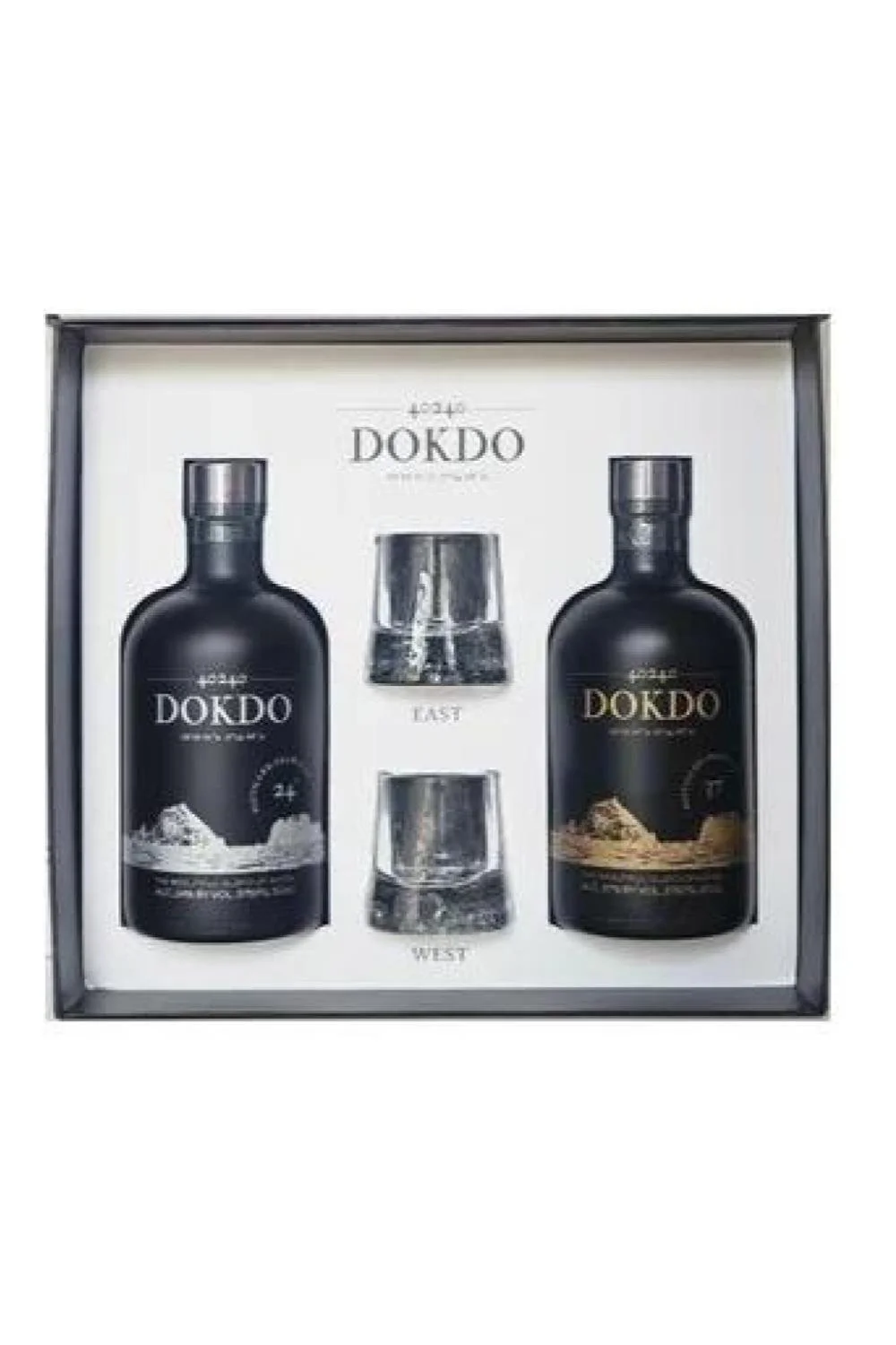 A gift set with two bottles of DOKDO brand whiskey and two branded glasses in a box.