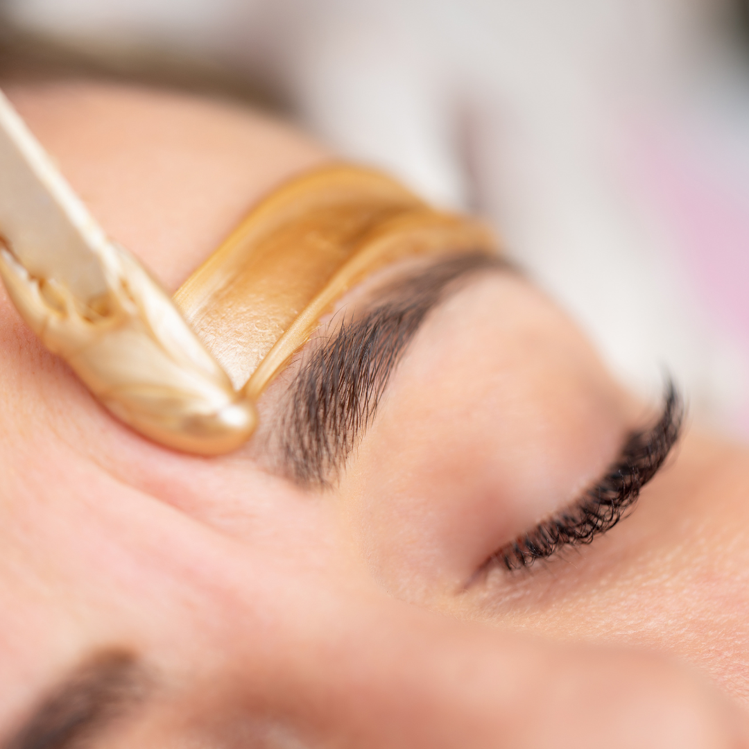 Professional brow waxing service at DK Spa for clean, defined results.