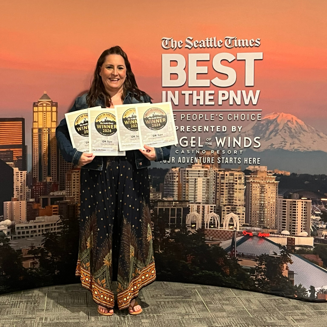 Dana of DK Spa holding four 2026 Best in the PNW awards at The Seattle Times People’s Choice celebration.