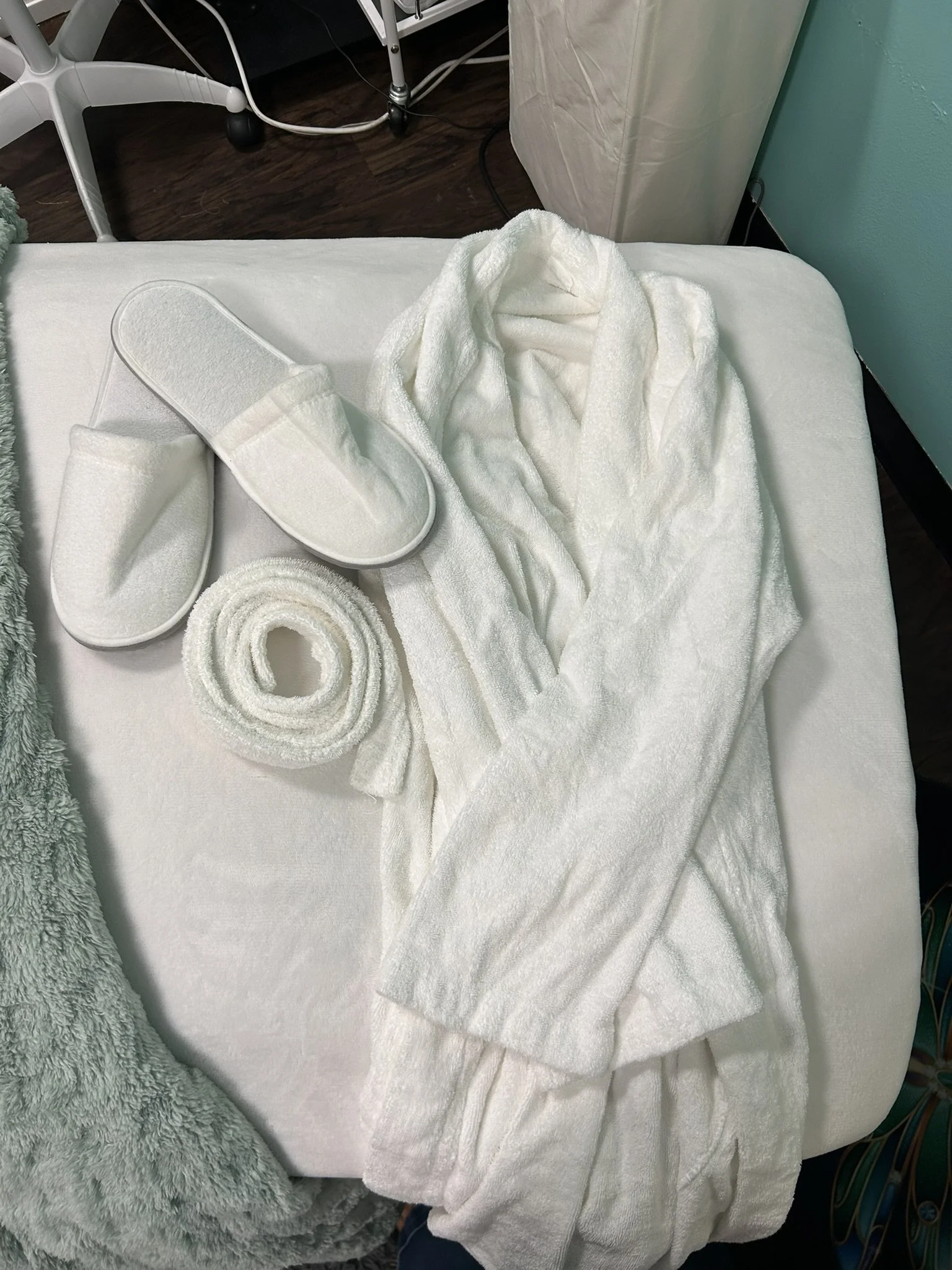 Cozy robe and slippers ready for the Sanctuary Experience at DK Spa in Lynnwood, Washington.