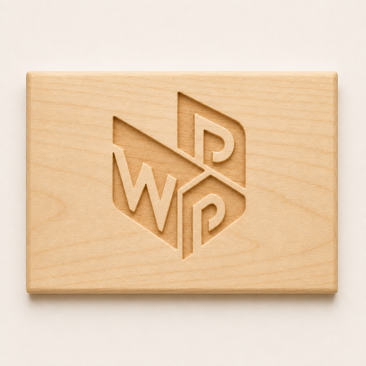 Three-dimensional carved logo with recessed relief in a wooden panel.