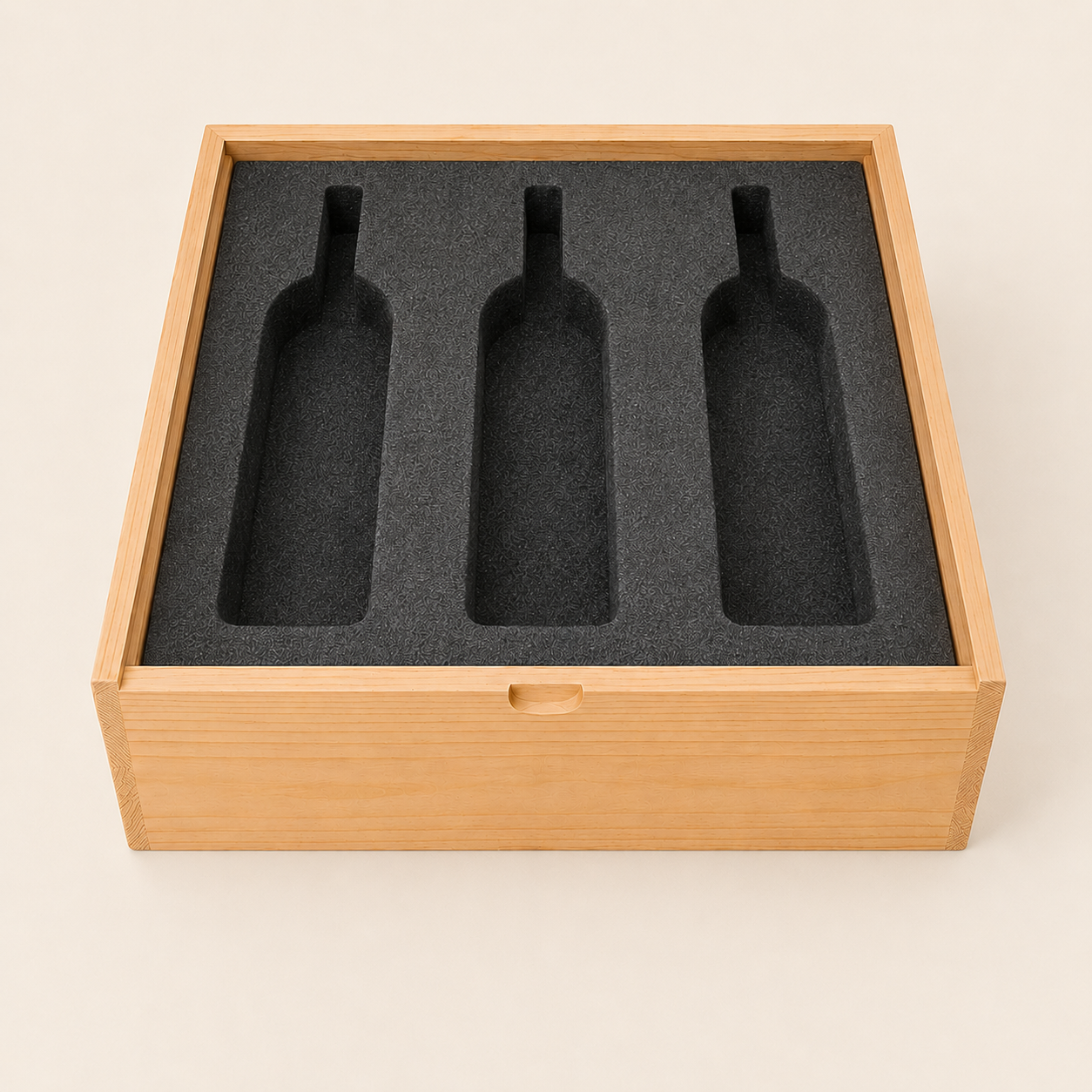 Precision-cut EVA foam insert holding a wine bottle inside a custom box.