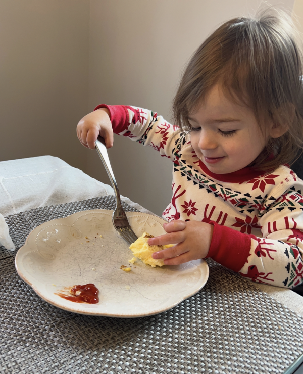 baby eating aunt toni's breakfast