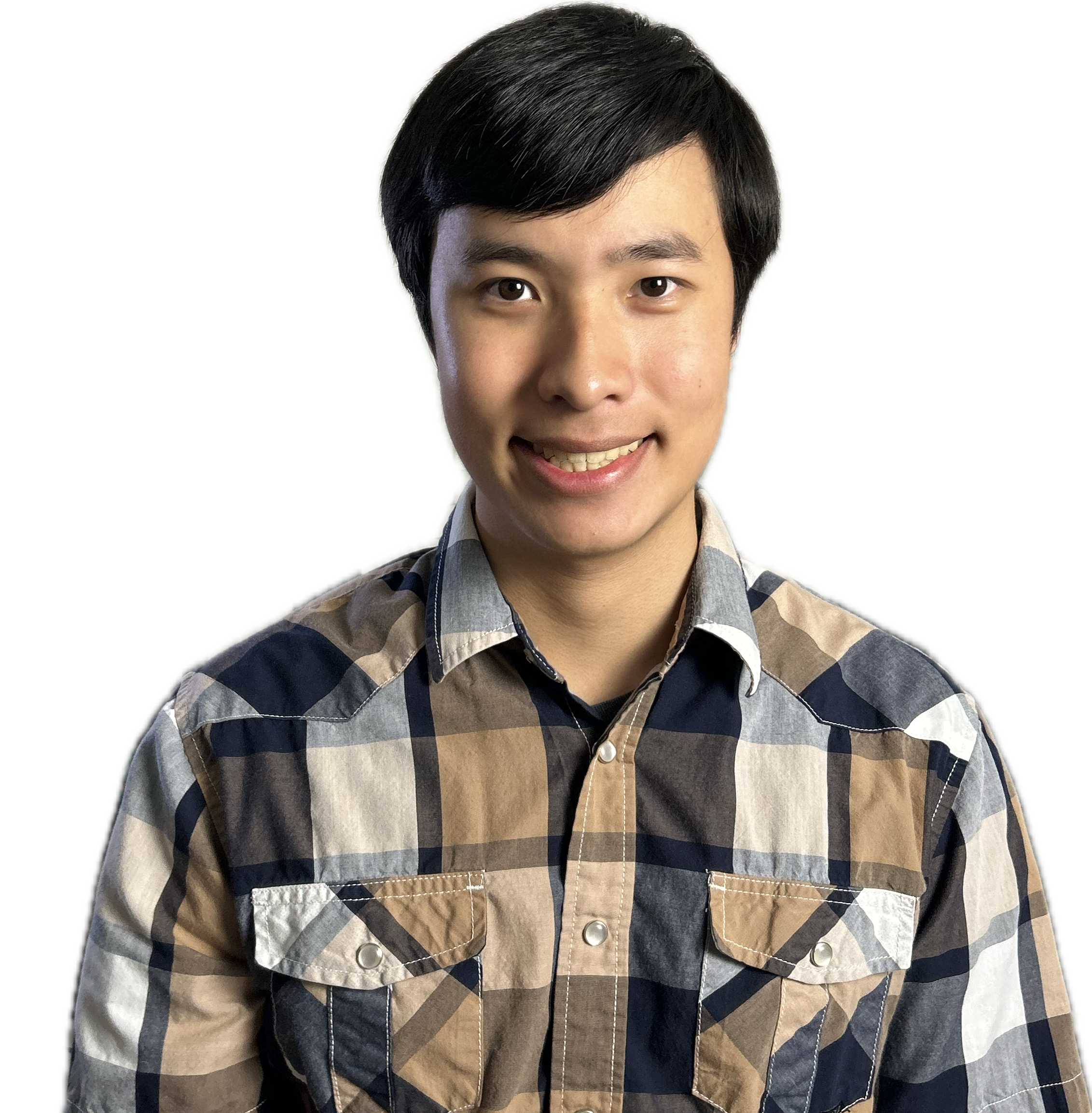 Young man with dark hair smiling, wearing a plaid shirt, against a black background.