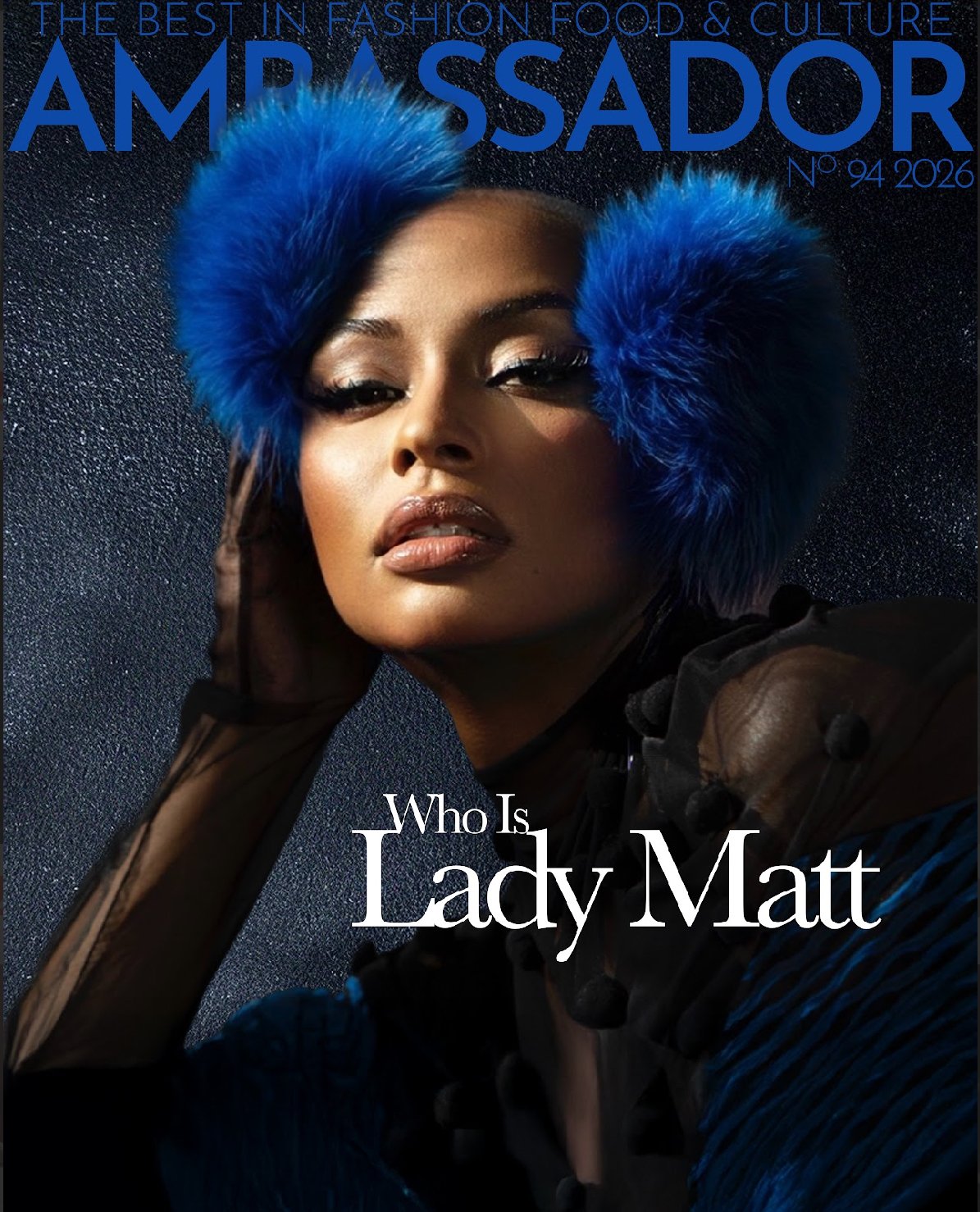Cover of "AMBASSADOR" digital magazine featuring Lady MATT with blue earmuffs, wearing a black sheer top with pom-pom details, posing with one hand touching her face and a dark background.