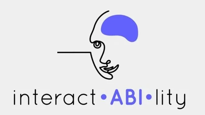 Logo featuring a minimalistic outline of a human face with a blue patch on the head, illustrating the word 'interactability' with 'ABI' highlighted in the middle.