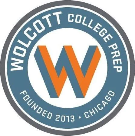 Wolfcott College Prep logo featuring a central orange and blue 'W' surrounded by a blue circle with white text and a gray border, indicating it was founded in 2013 in Chicago.