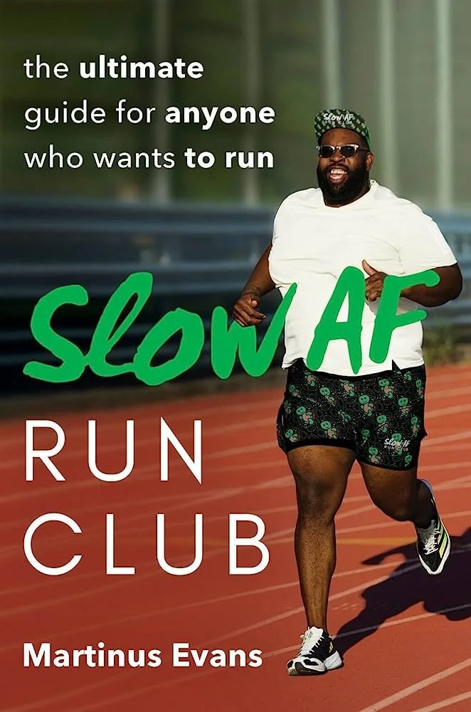 Man running on track wearing sunglasses, white t-shirt, black patterned shorts, and a green cap with 'Slow AF' written on it. Overlaid text says: 'The ultimate guide for anyone who wants to run slow AF. Run club. Martinus Evans.'