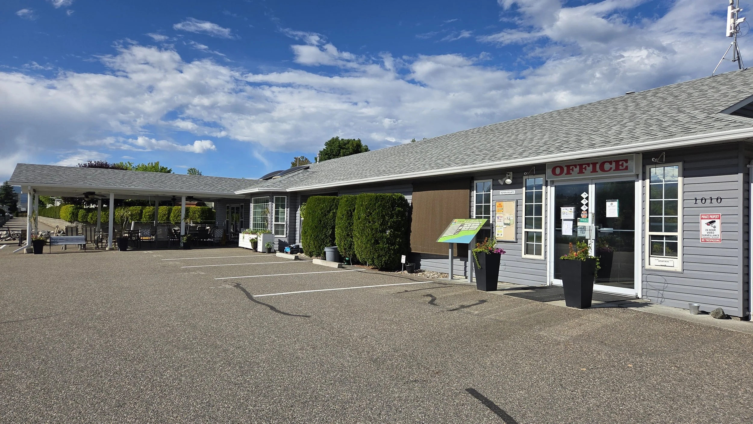 Swan Lake RV Resort office, clubhouse and covered area for use by residents, visitors and renters.