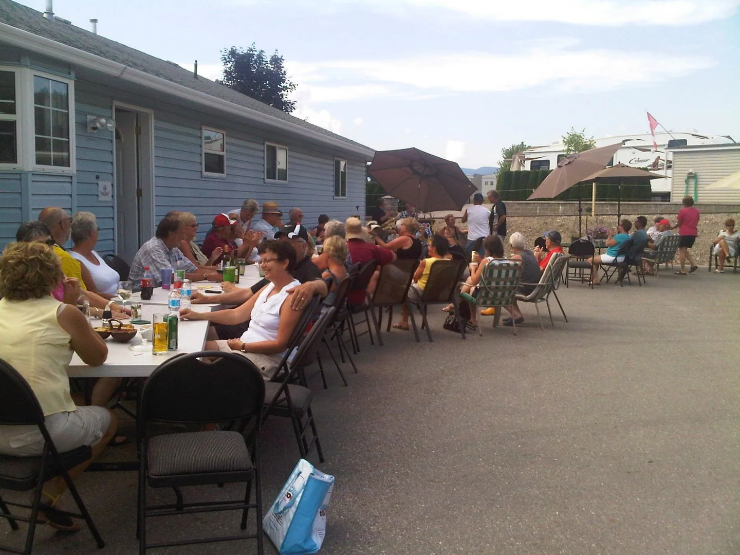 Swan Lake RV Resort gathering in front of the clubhouse.