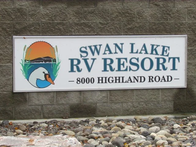 Swan Lake RV Resort entrance sign.