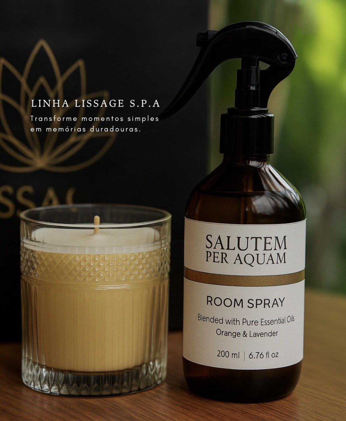 A brown spray bottle labeled 'Salutem Per Aquam Room Spray' with 'Blended with Pure Essential Oils Orange & Lavender' 200 ml next to a yellow candle in a textured glass holder, By Voyde Wellbeing Signature Scenting