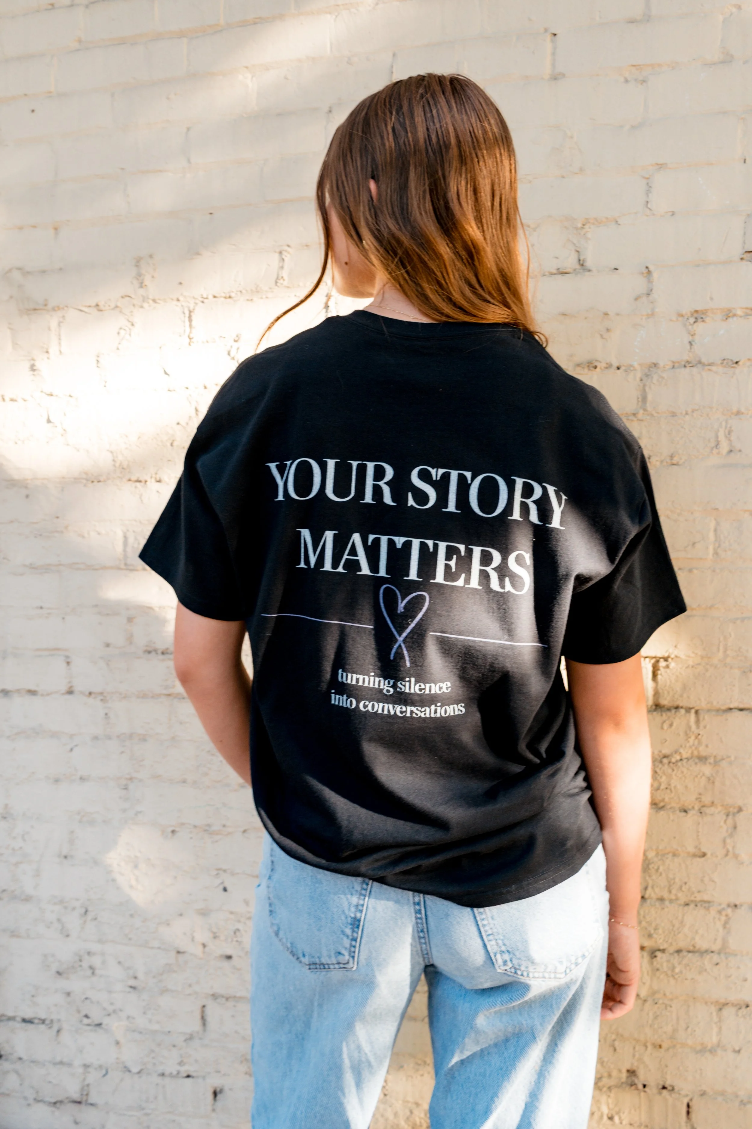 Back of a StandUp33 T-shirt featuring the message, "Your Story Matters."