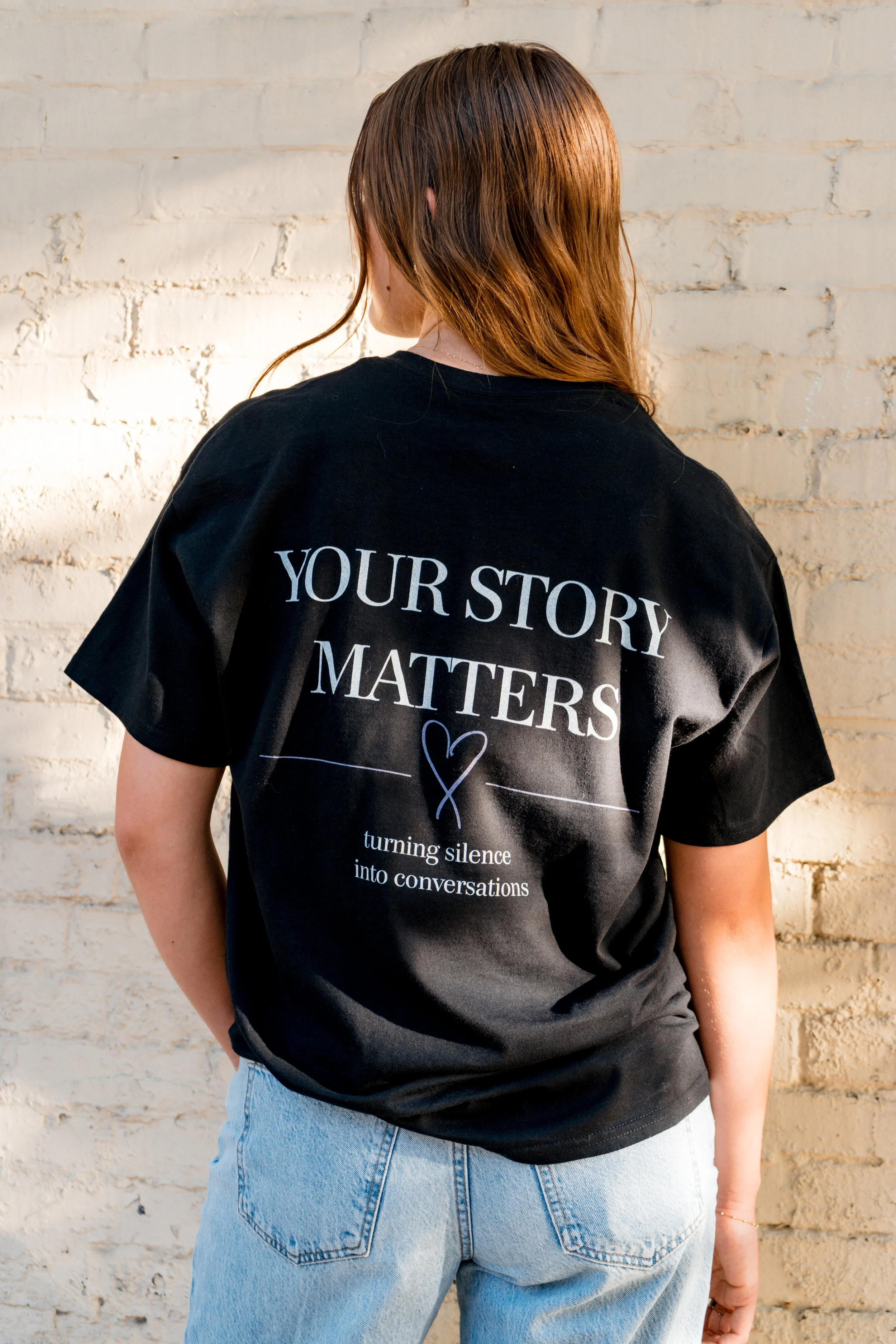 Back of a StandUp33 T-shirt showing the message, "Your Story Matters."