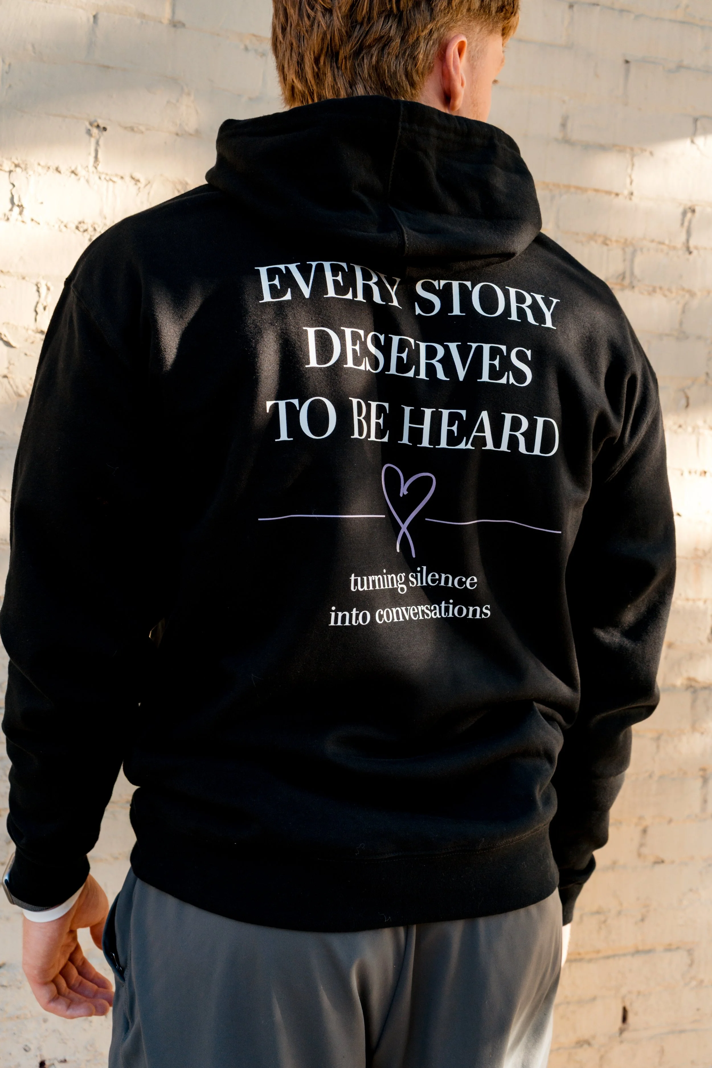 Back of StandUp33 hoodie with a purple heart and awareness message.