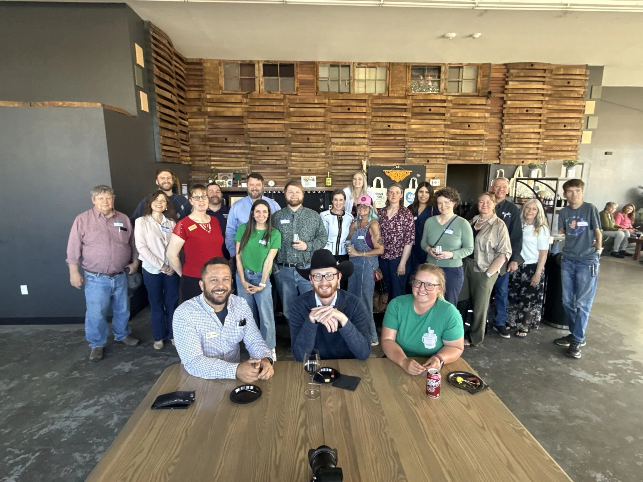 Photo: group of small business owners and entrepreneurs gather to share and learn from each other