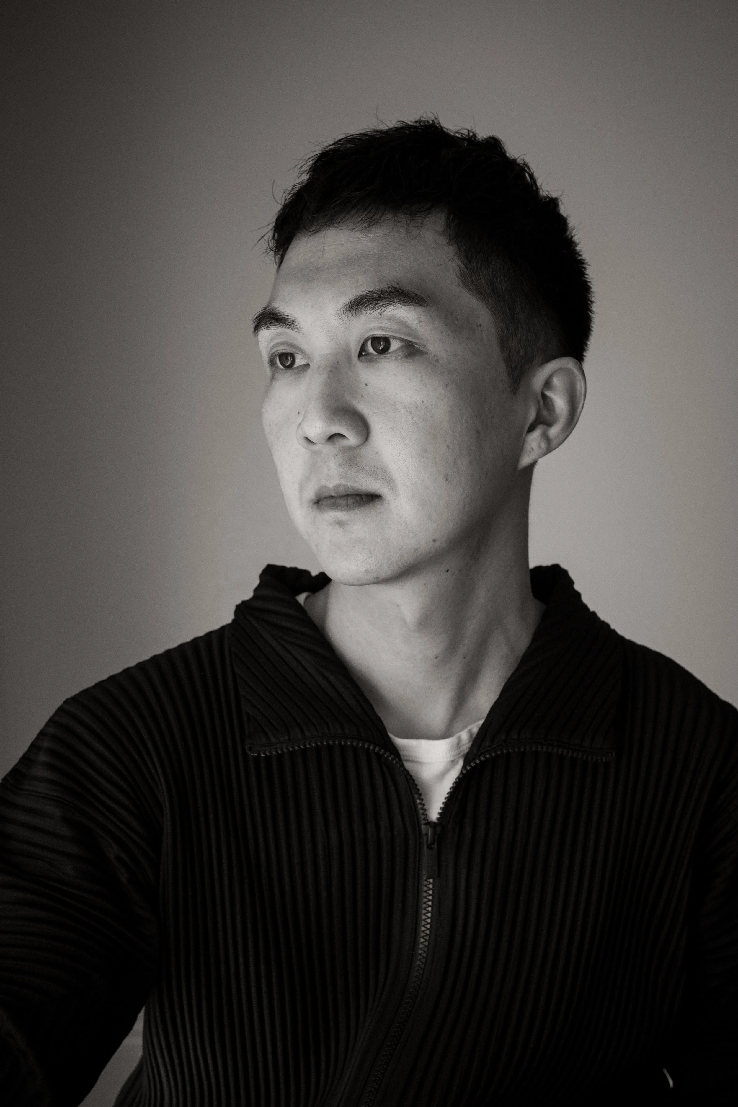 Ryan Sadamitsu, founder of Zelkova Advisory, in a black-and-white portrait