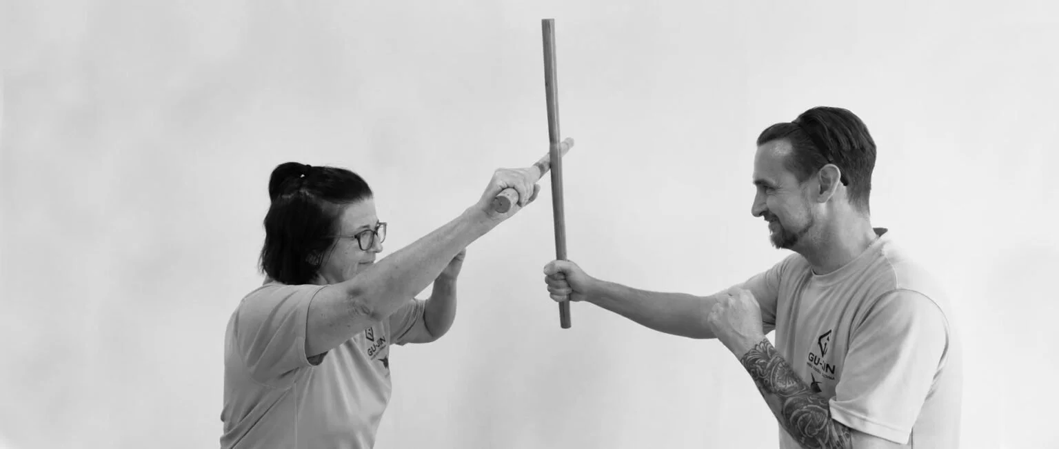 woman training escrima martial art