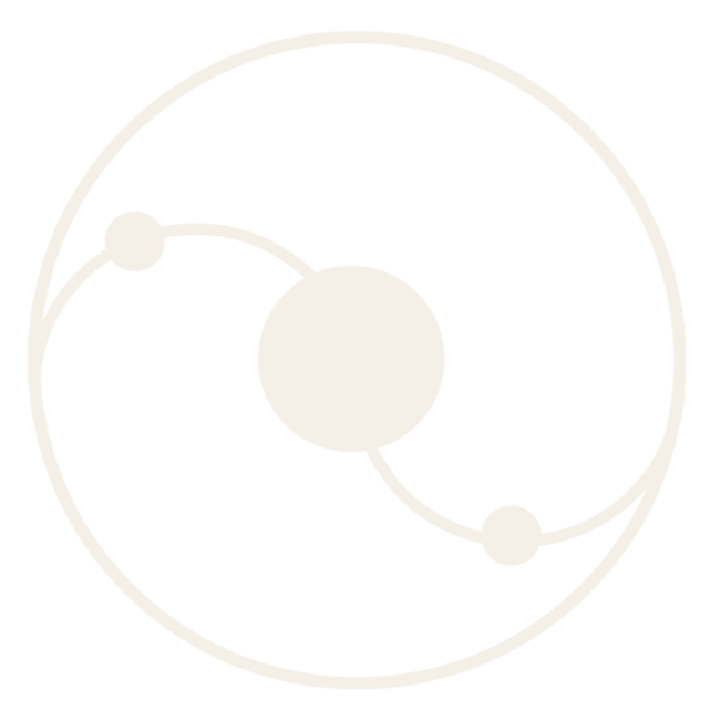Simplified illustration of an atom with a central nucleus and electrons orbiting around it.