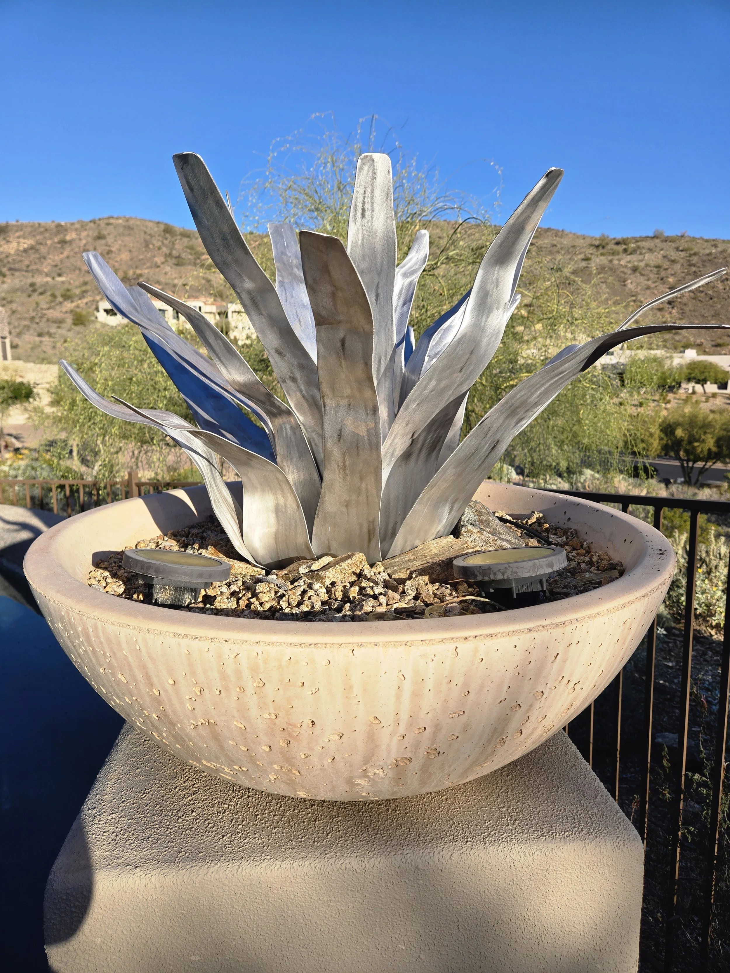 Aluminum agave sculpture in a desert landscape, custom metal artwork by Full Spectrum Artworks in Phoenix