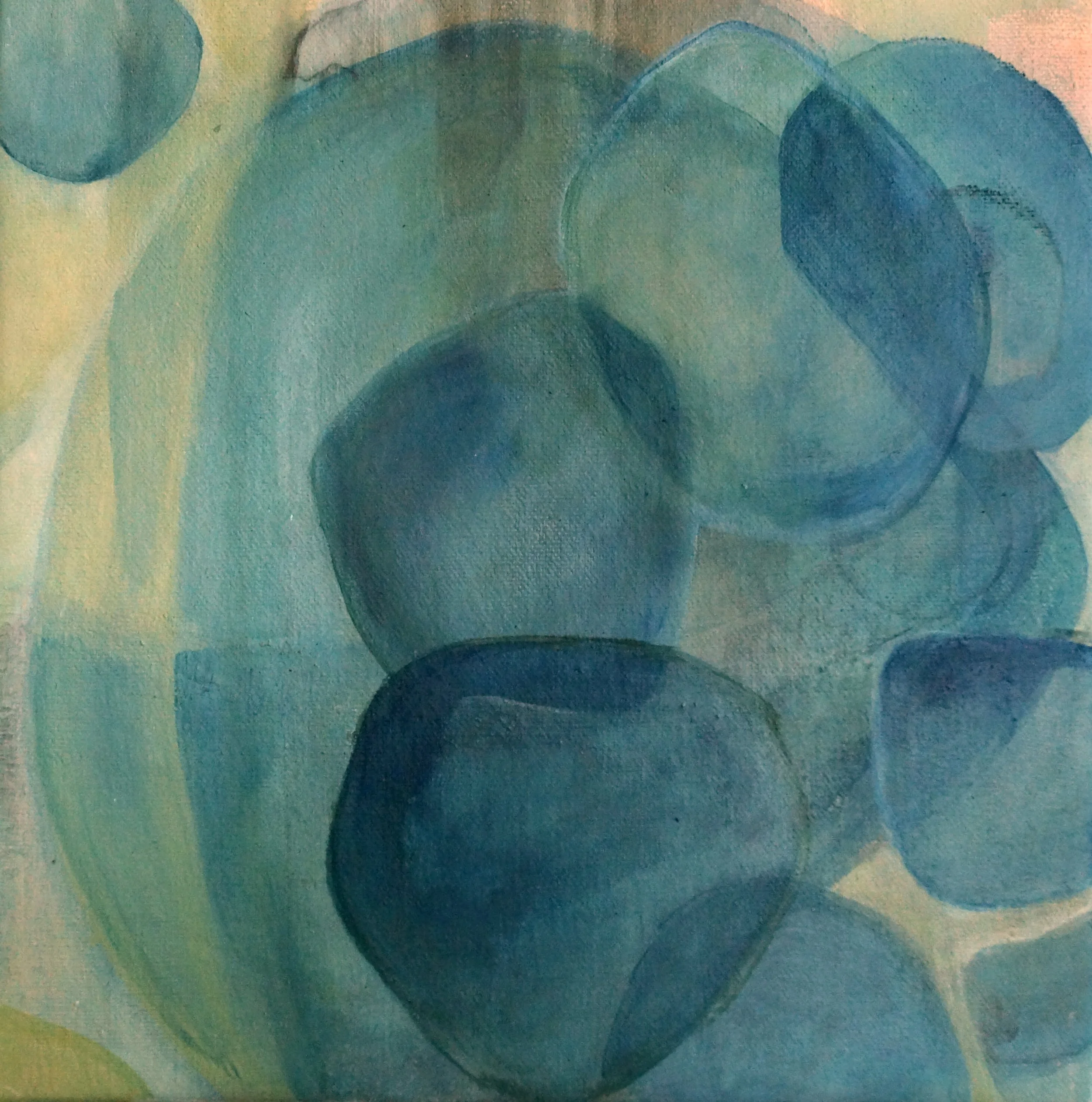 Abstract watercolor painting with blue and teal circular shapes on a pale yellow and pink background.
