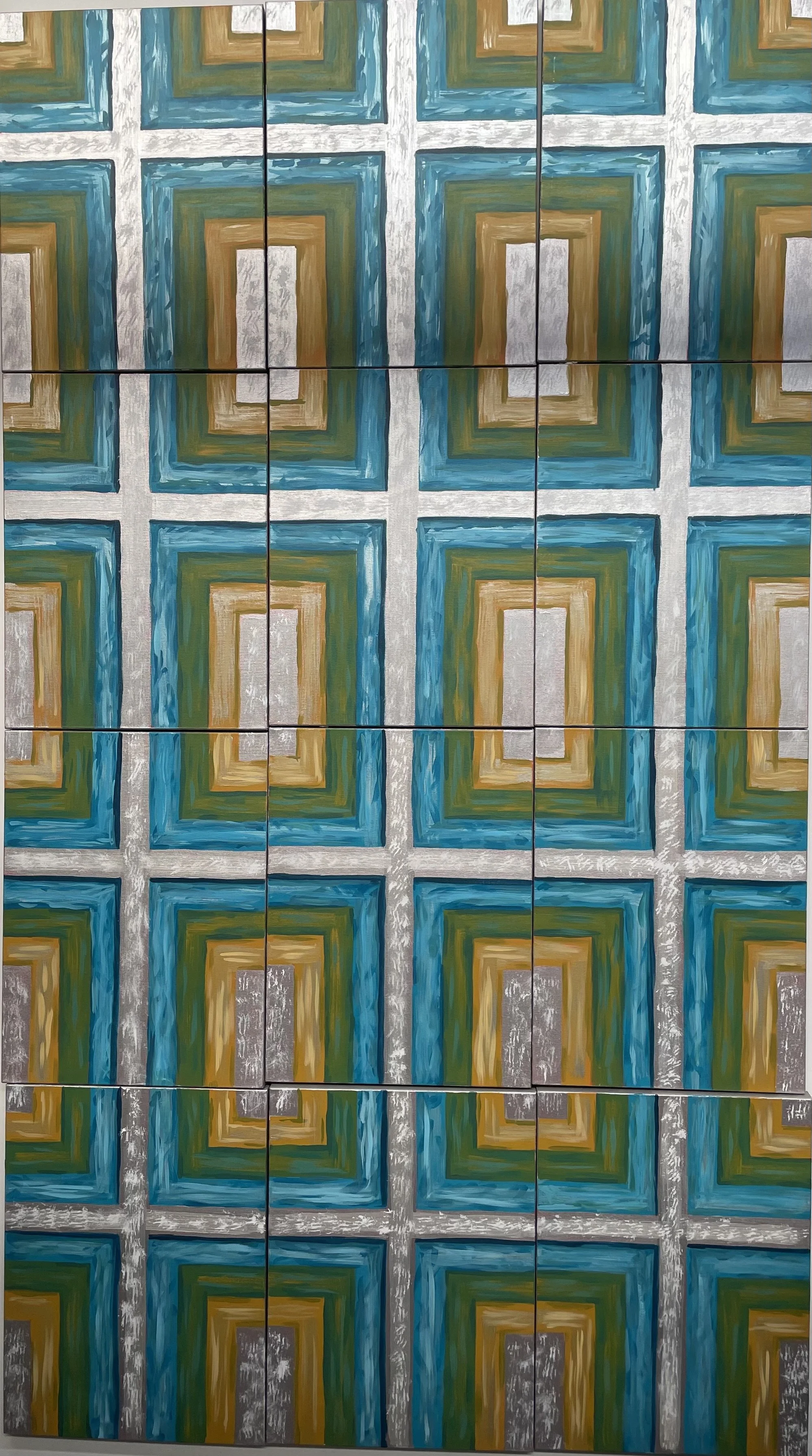 "Gudrun's Cross" twelve paintings of white crosses with blue, green, and yellow backgrounds.
