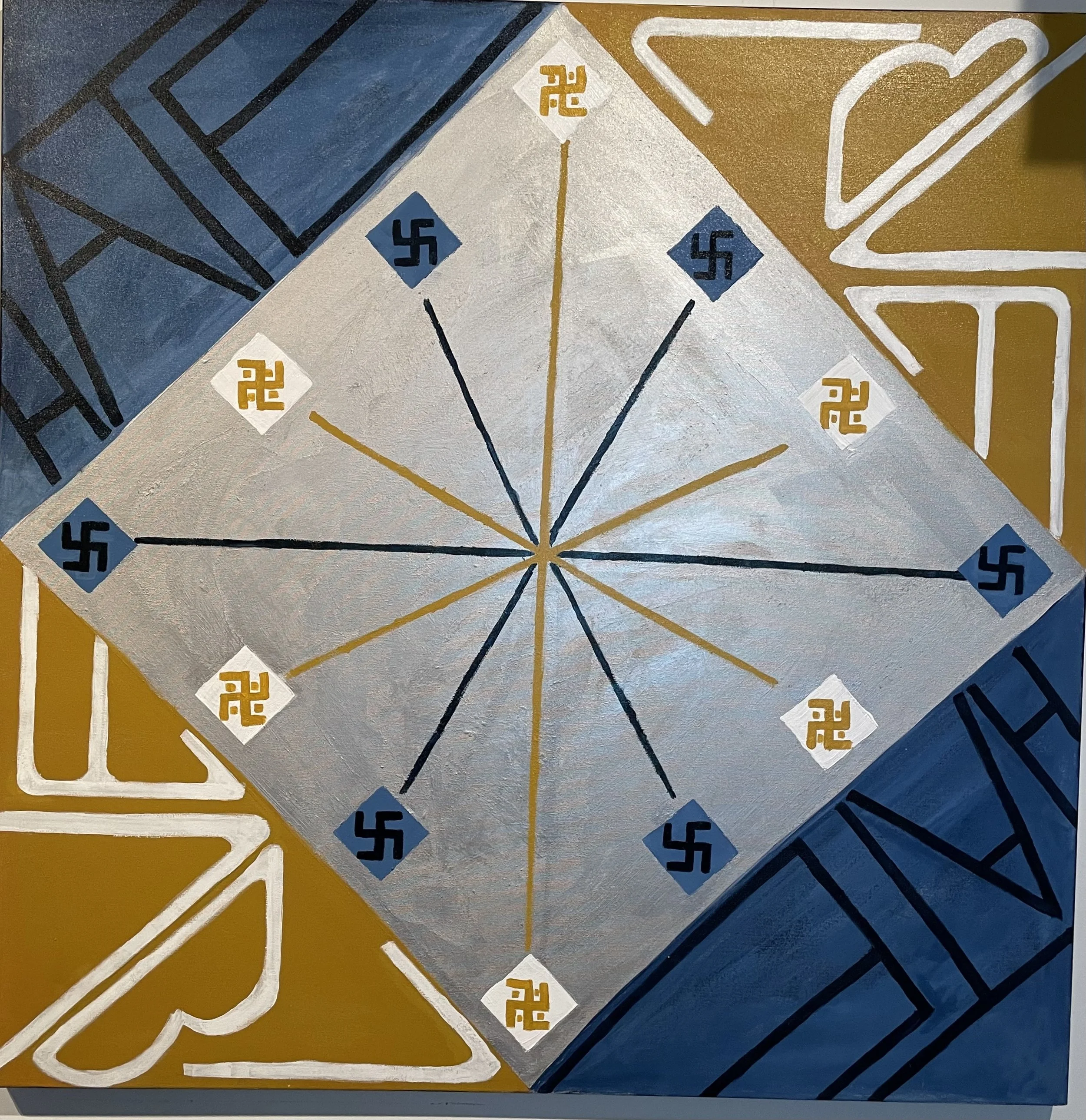 "The Fine Line Between Love and Hate" A geometric painting featuring Prussian blue, white, and gold sections with swastika symbols and their flipside meaning peace in many cultures.