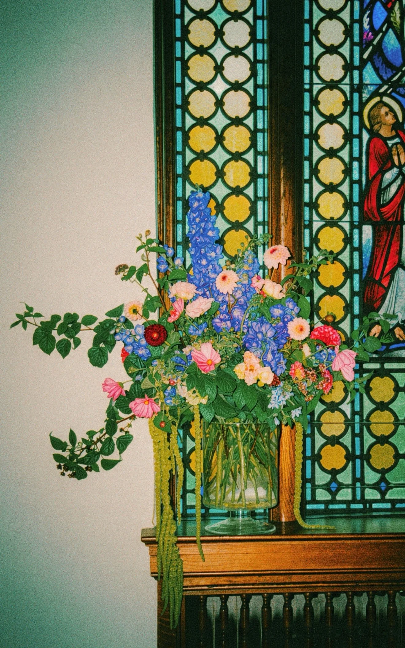 Colorful bouquet with raspberries and flowers