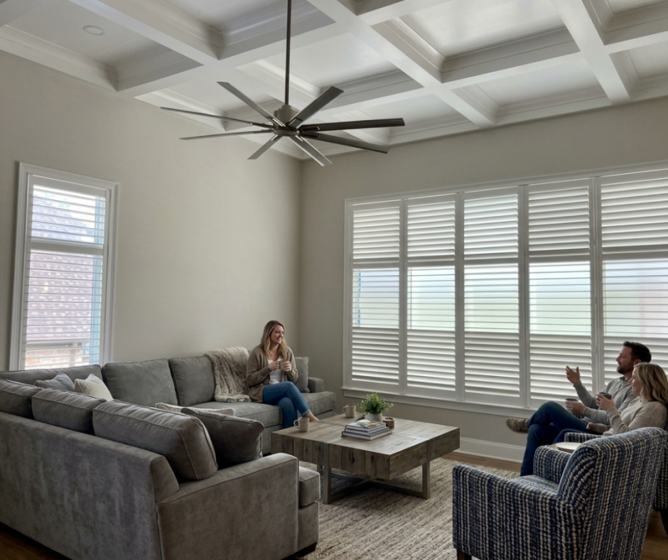 Custom plantation shutters in a bright living room — Rose CWT Cleveland Ohio