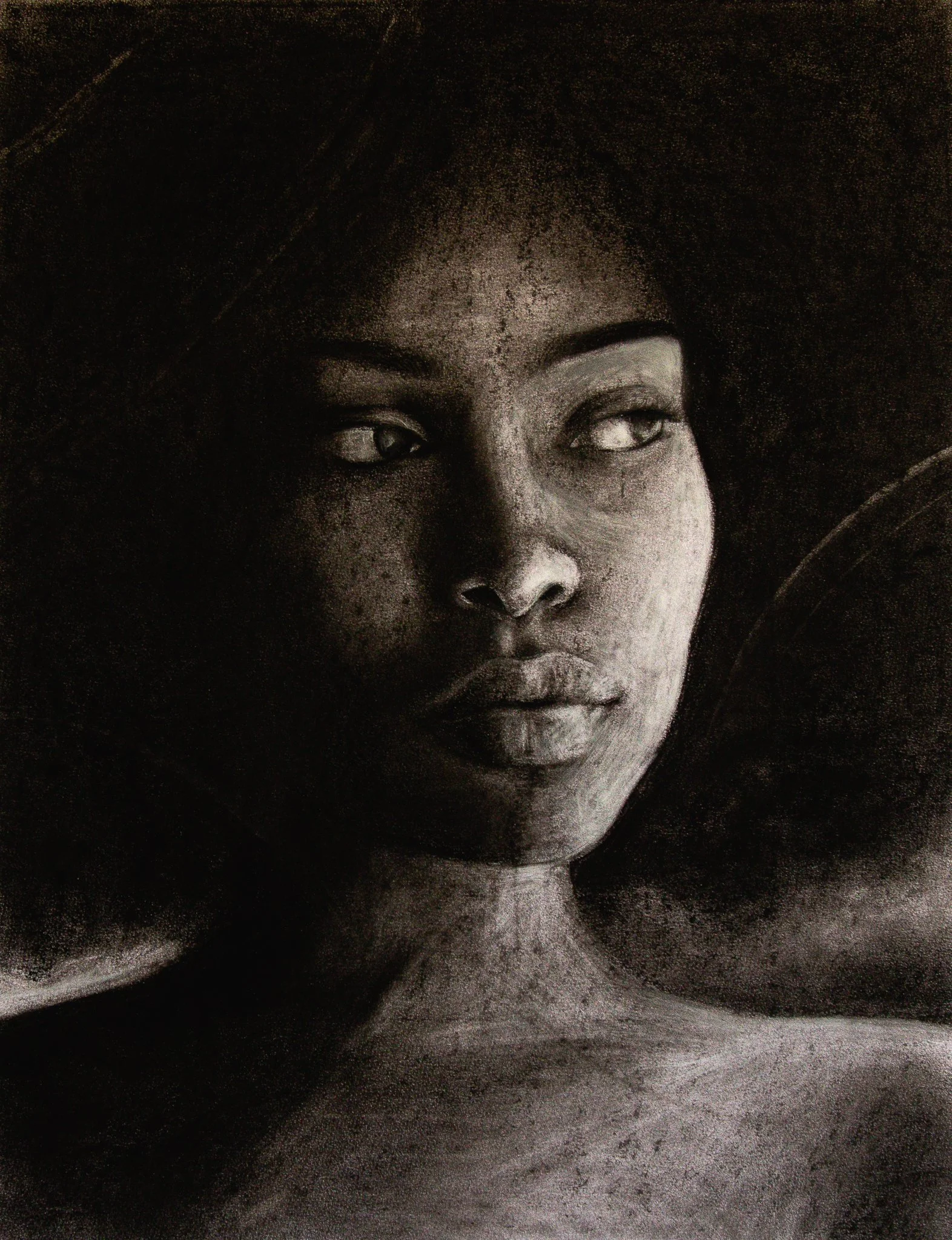 Close-up of a woman's face, showing her left eye and part of her nose and lips, with detailed shading and highlights in black and white.