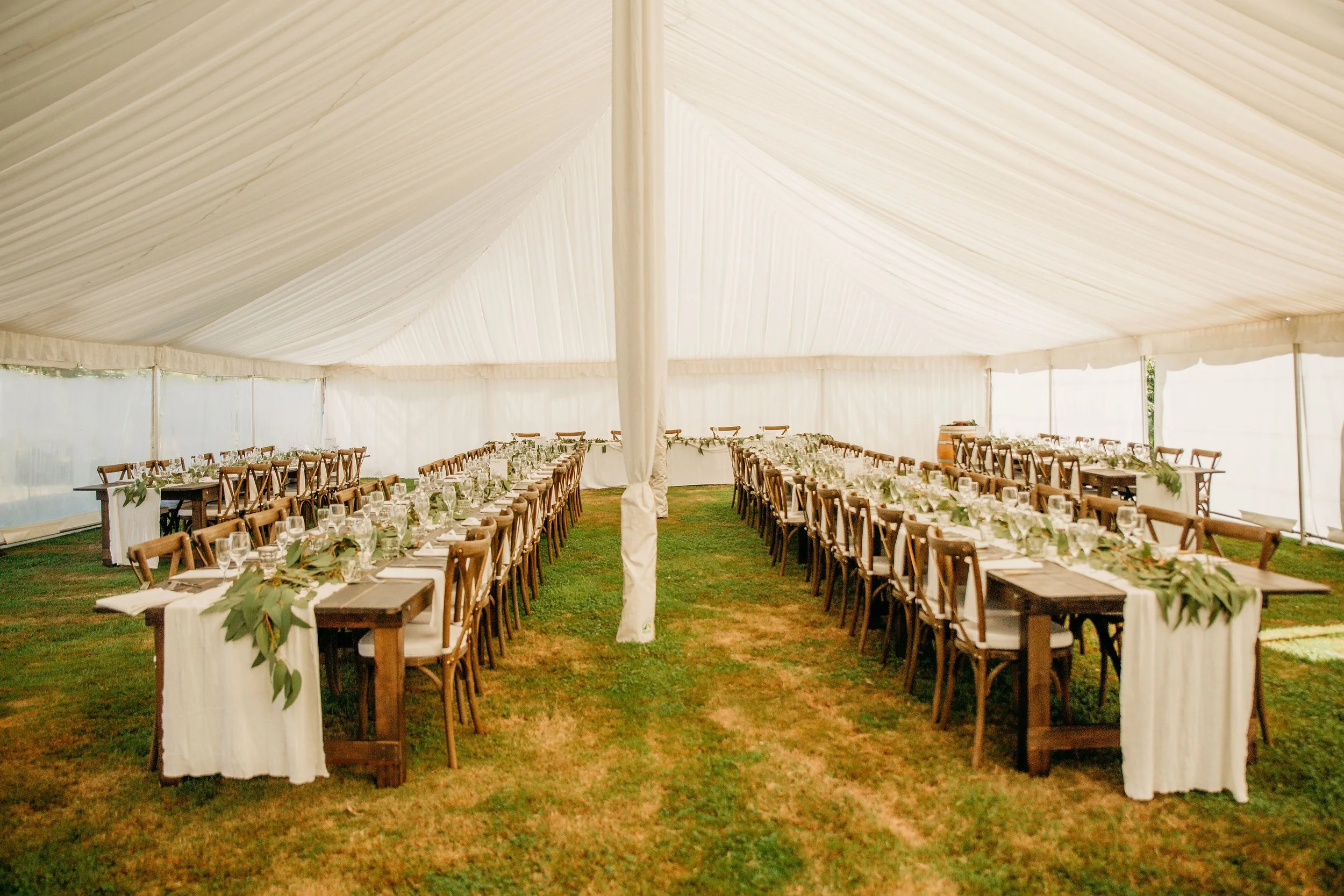 Rustic wooden arch with florals bride and bride