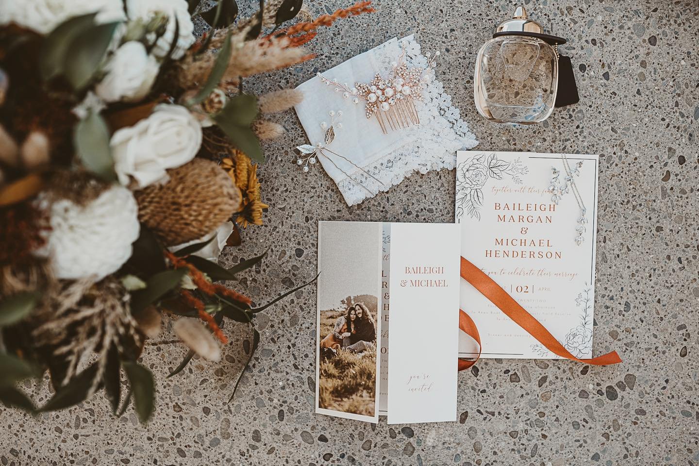 Wedding flat lay invitations and florals