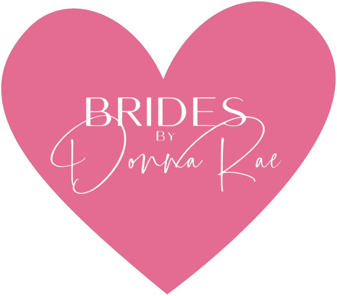 Pink heart with the text "Brides by Donna Rae" written in white, with a mix of serif and cursive fonts.