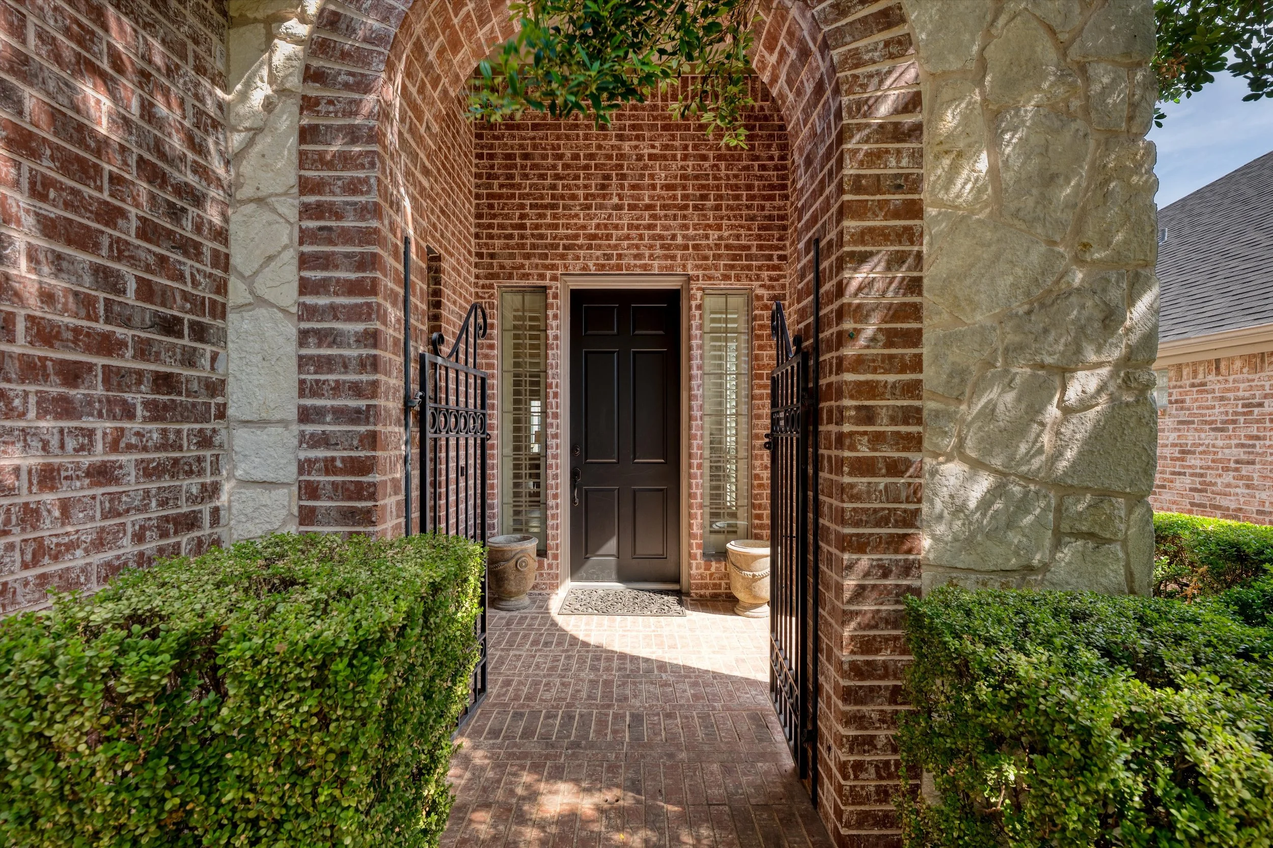 Traditional brick home in the Stonebridge Ranch community of McKinney, Texas. Tanglewood Villas village.