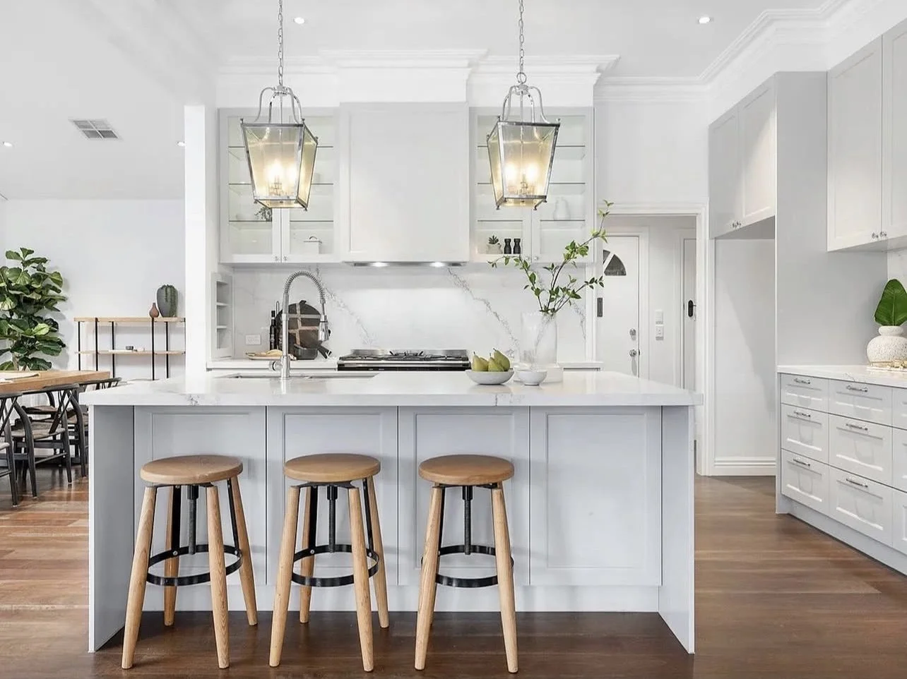 Custom kitchen build: modern white kitchen with a large island