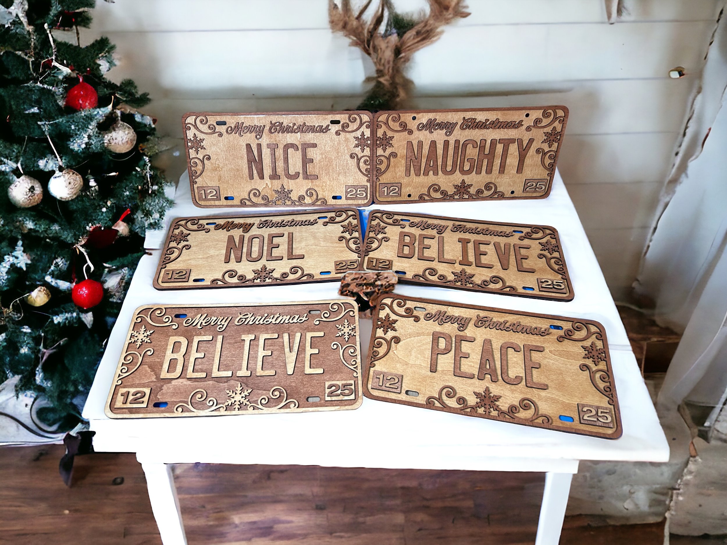 Stained wood Christmas Saying inspired license plates; "Nice", "Naughty", "Noel", "Believe", "Peace"