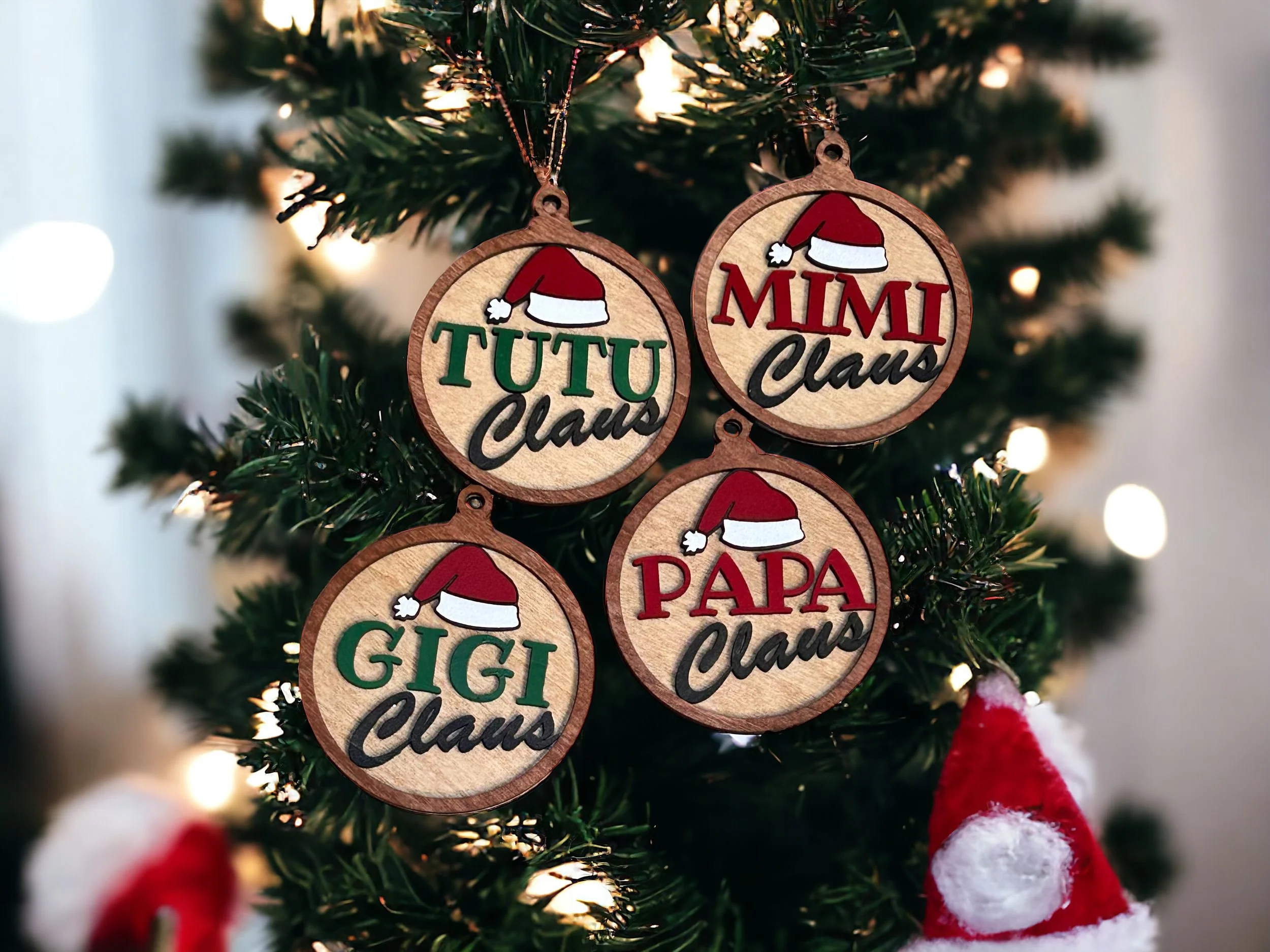 Specialty Ornaments with "Tutu Clause", "Mimi Clause", "Papa Clause", and "Gigi Clause"
