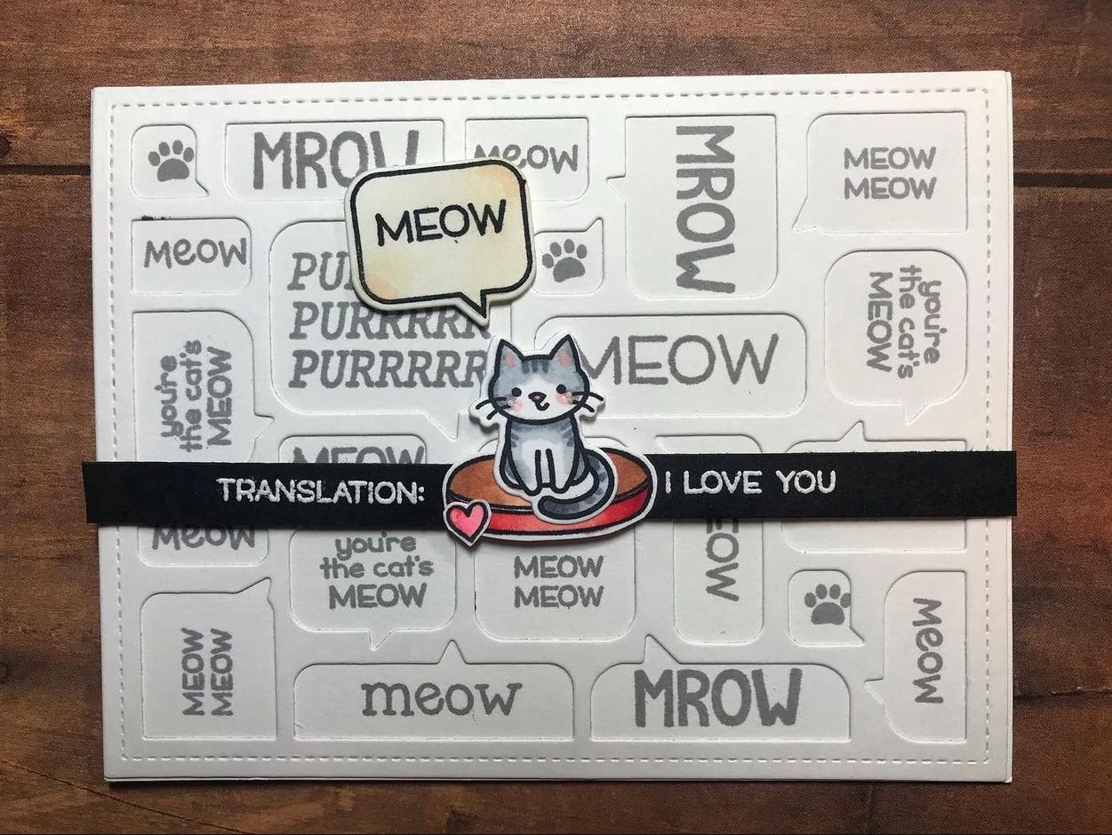 Specialty card with a cat and lots of "meow"s and "purr"s and sais "Translation: I Love You" 