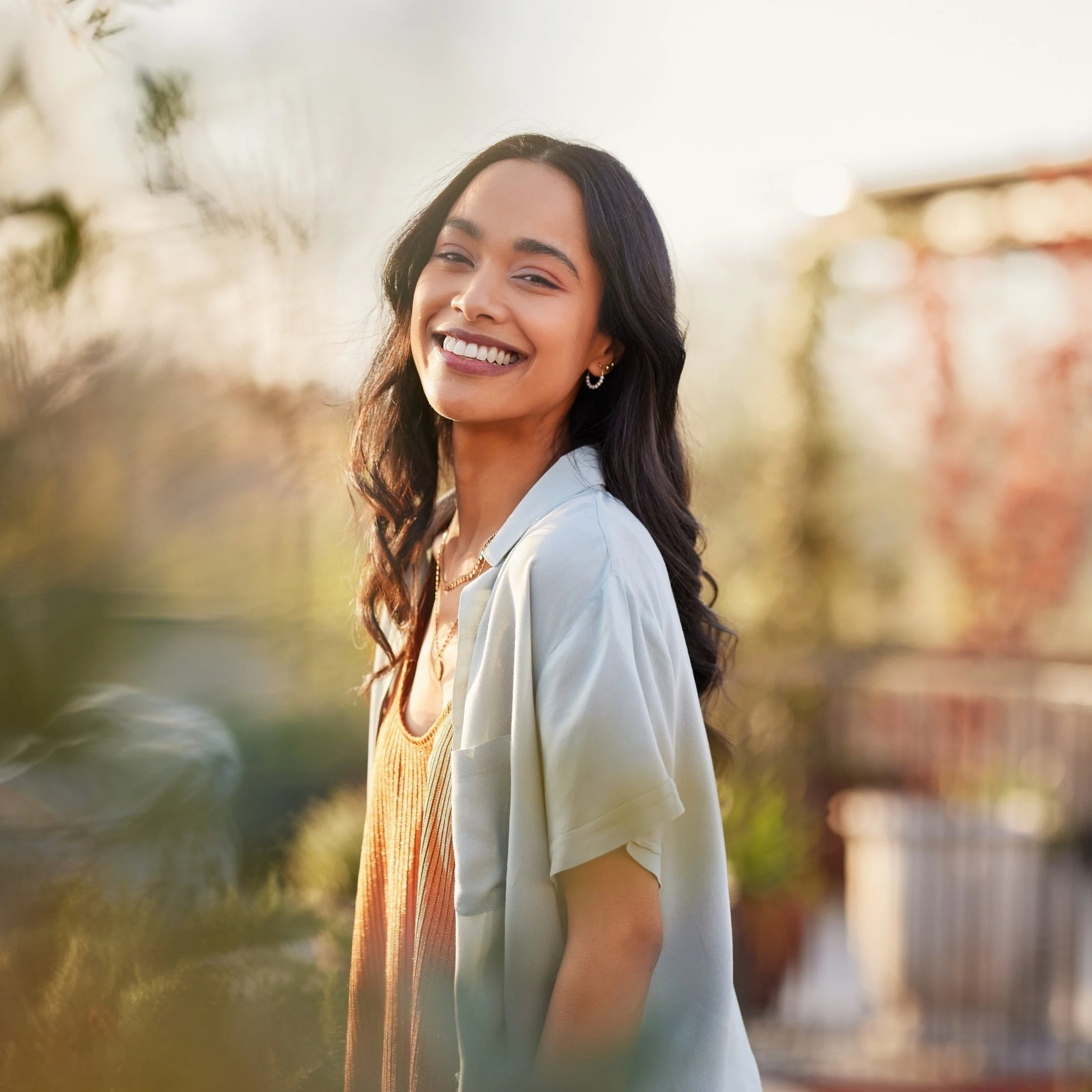 New York dietitian smiling outdoors on a sunny day