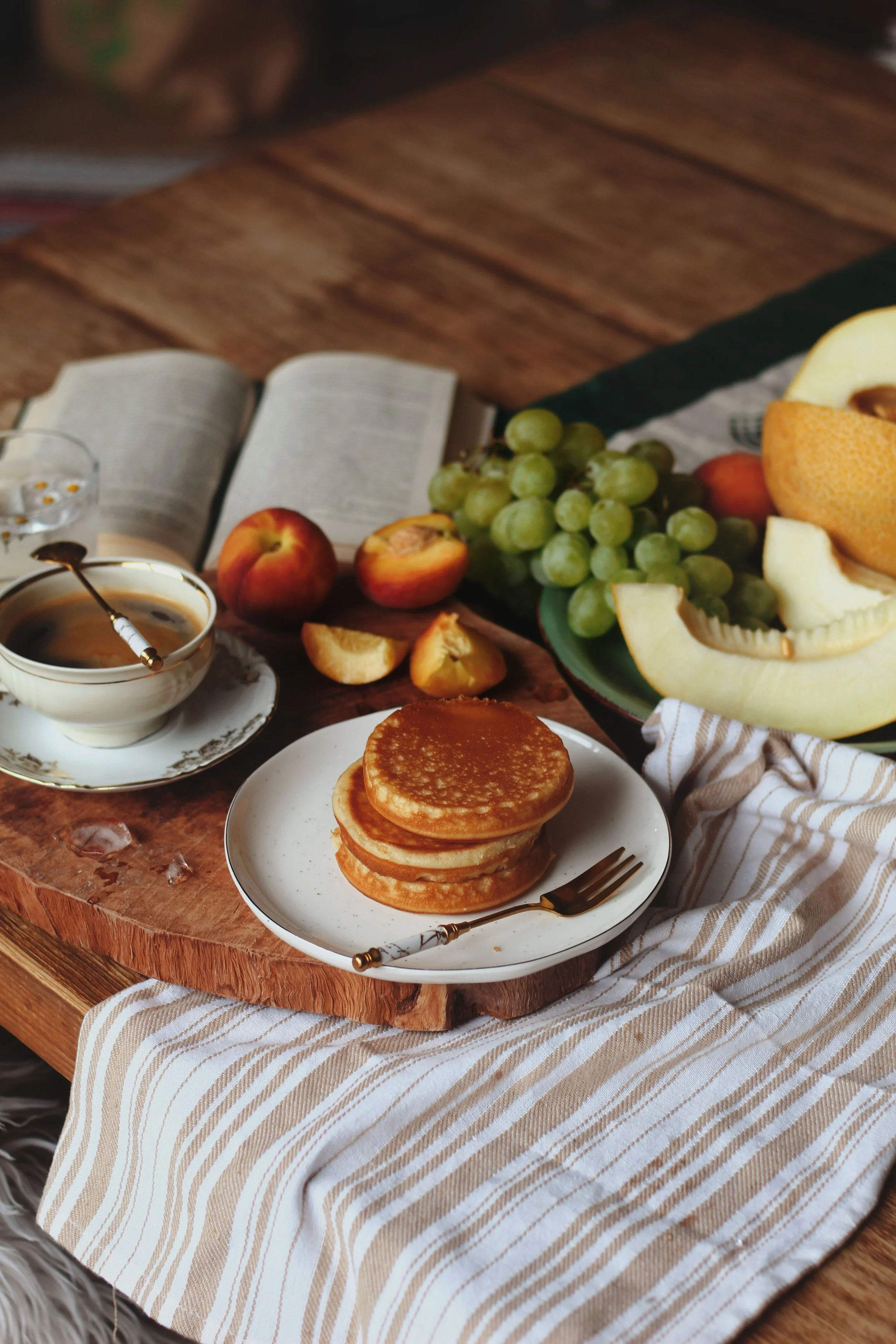 Balanced breakfast of pancakes and fresh fruit — real nutrition, no food rules