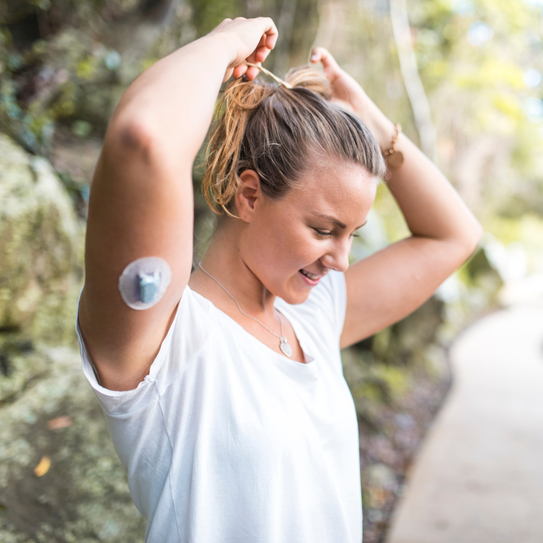 A woman with diabetes enjoying an active, energized day outdoors.