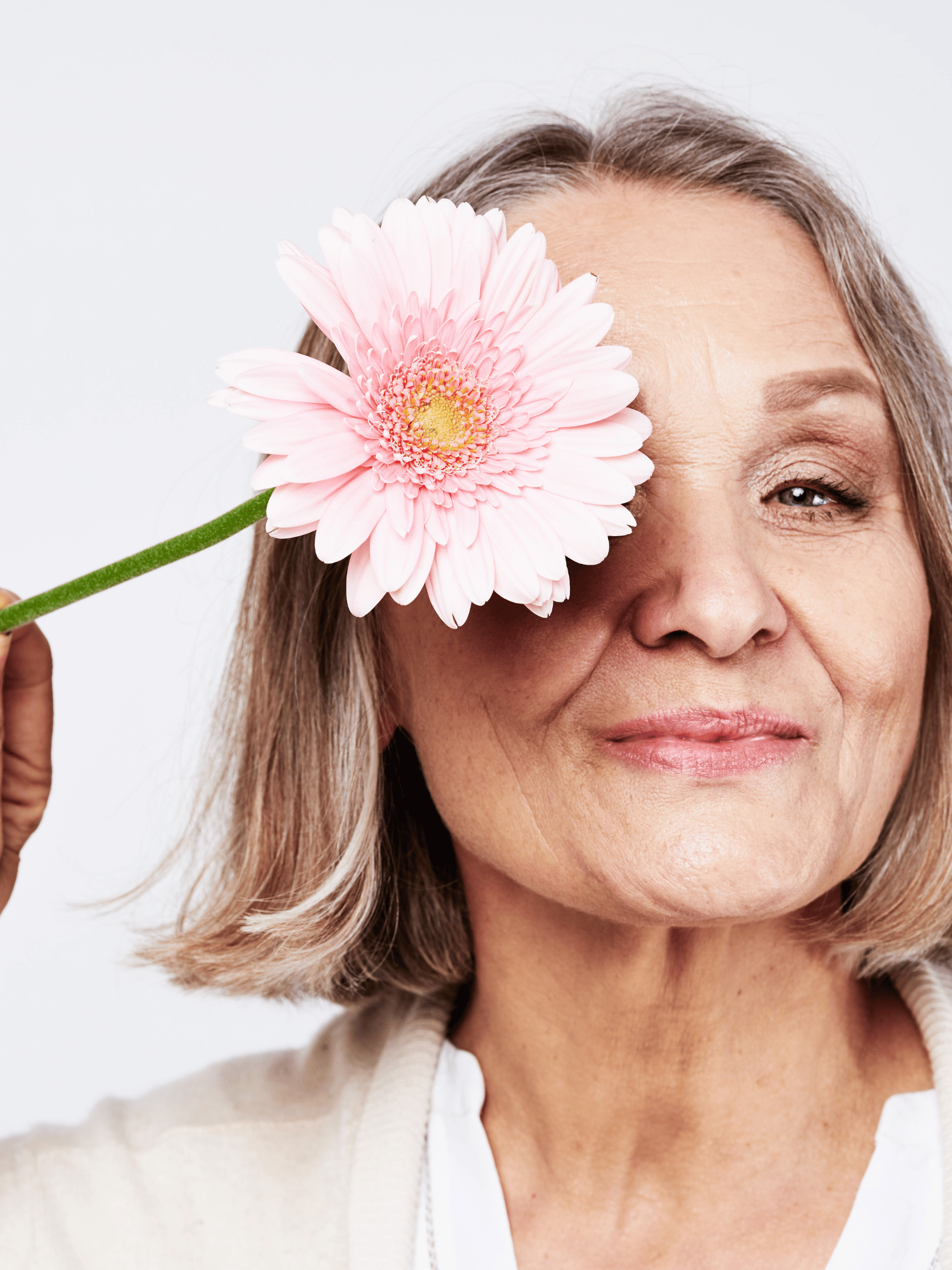 Smiling older woman — nutrition support through menopause.