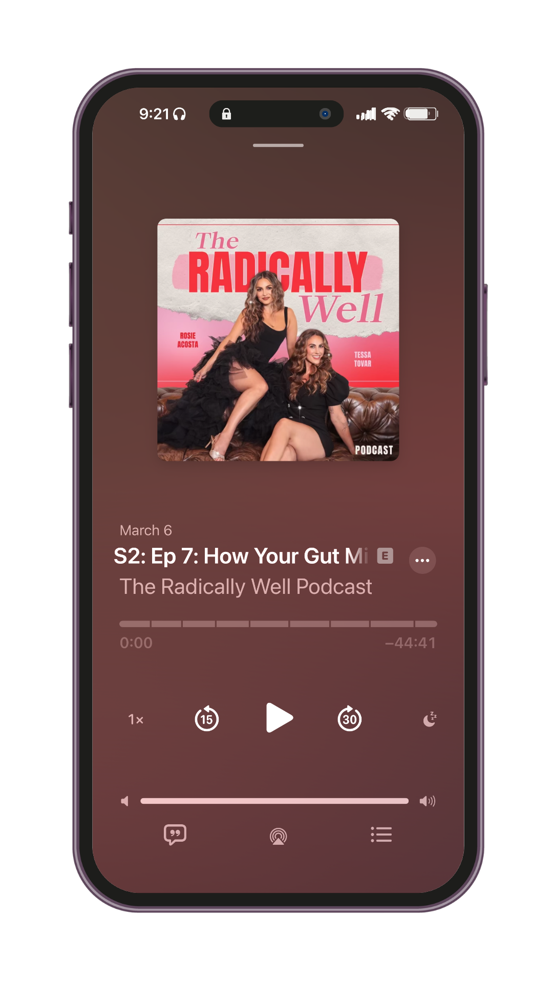 Screen showing a podcast episode titled 'S2: Ep 7: How Your Gut Mi' from 'The Radically Well Podcast' on a mobile device. The episode was released on March 6 and has a duration of 44 minutes and 41 seconds. The podcast cover features two women sitting on a brown couch, wearing black dresses, with the podcast title in bold red and pink text.