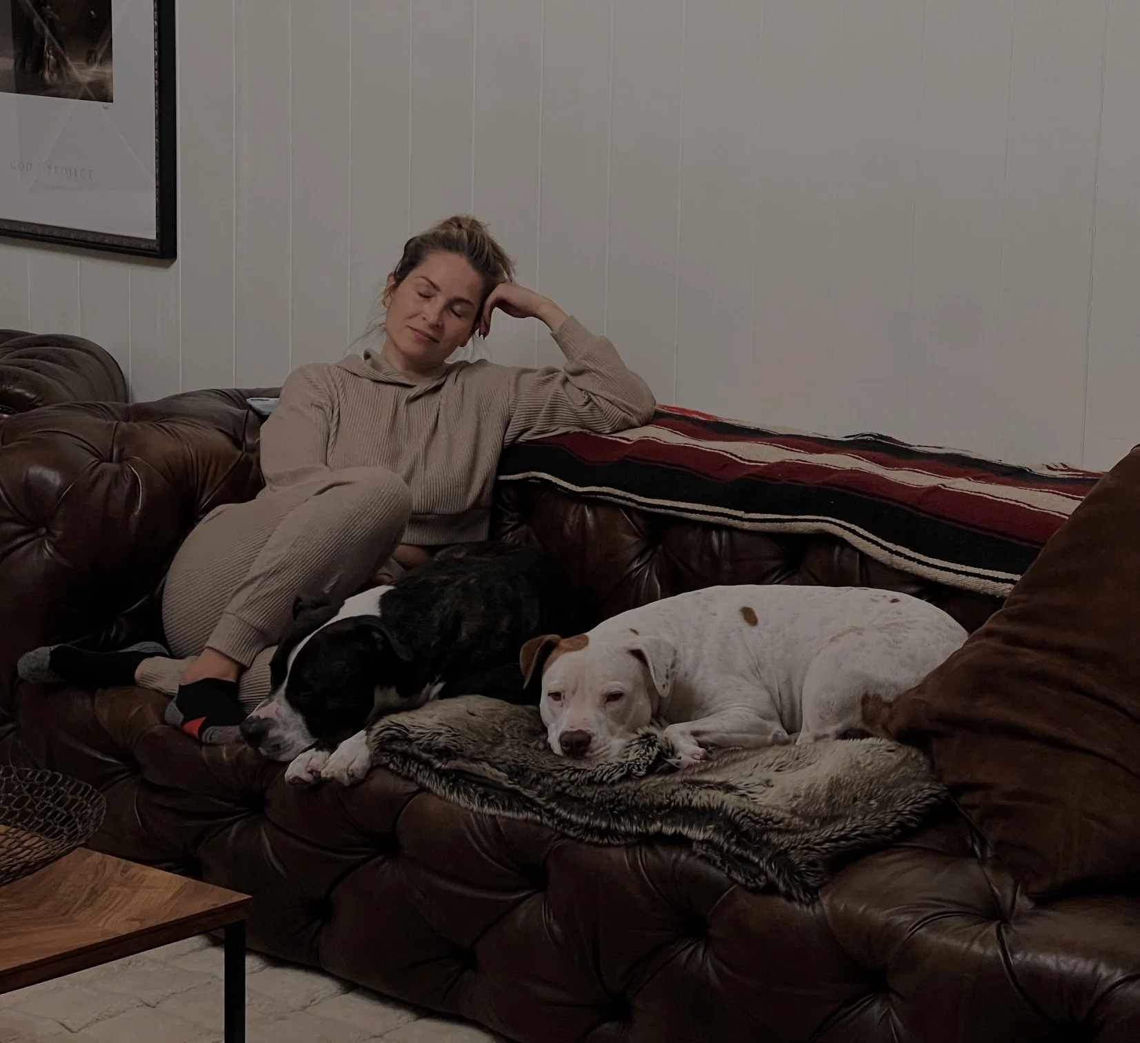 Rosie Acosta resting at home in the evening with her dogs, mindfulness support for perimenopause insomnia