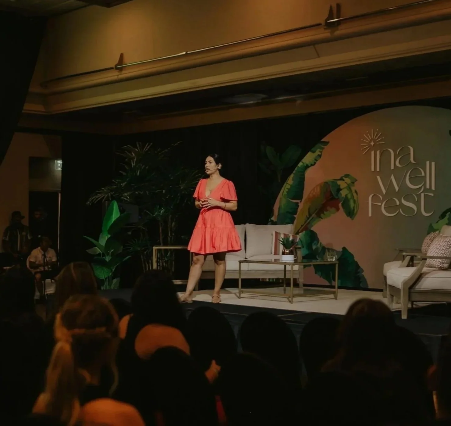 Rosie Acosta speaking on mindfulness, mental health coaching, stress management, and emotional resilience at Ina Wellness Fest in Guam.