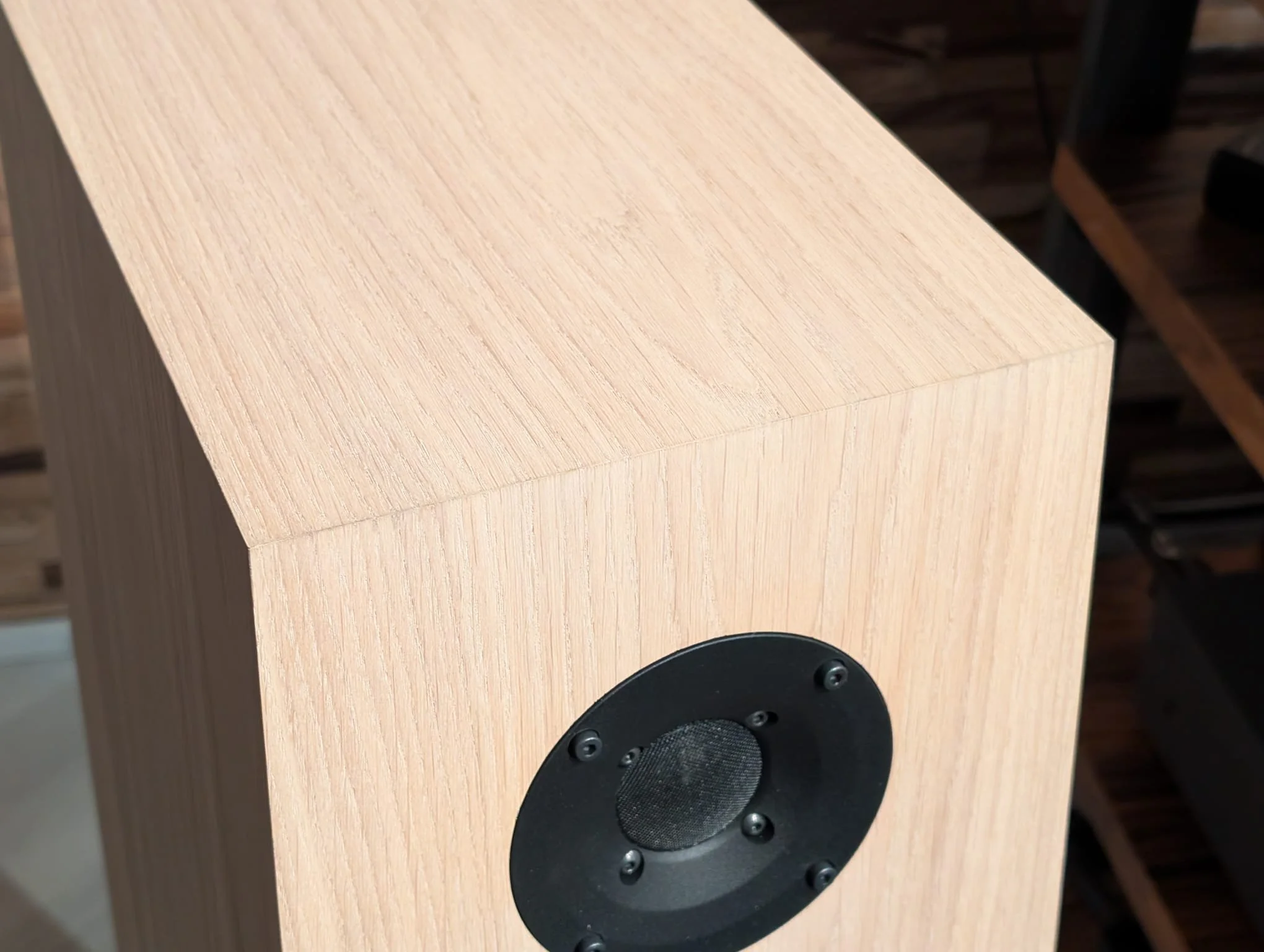 A detail showing the enclosure of an Ø Audio Frigg 02 loudspeaker