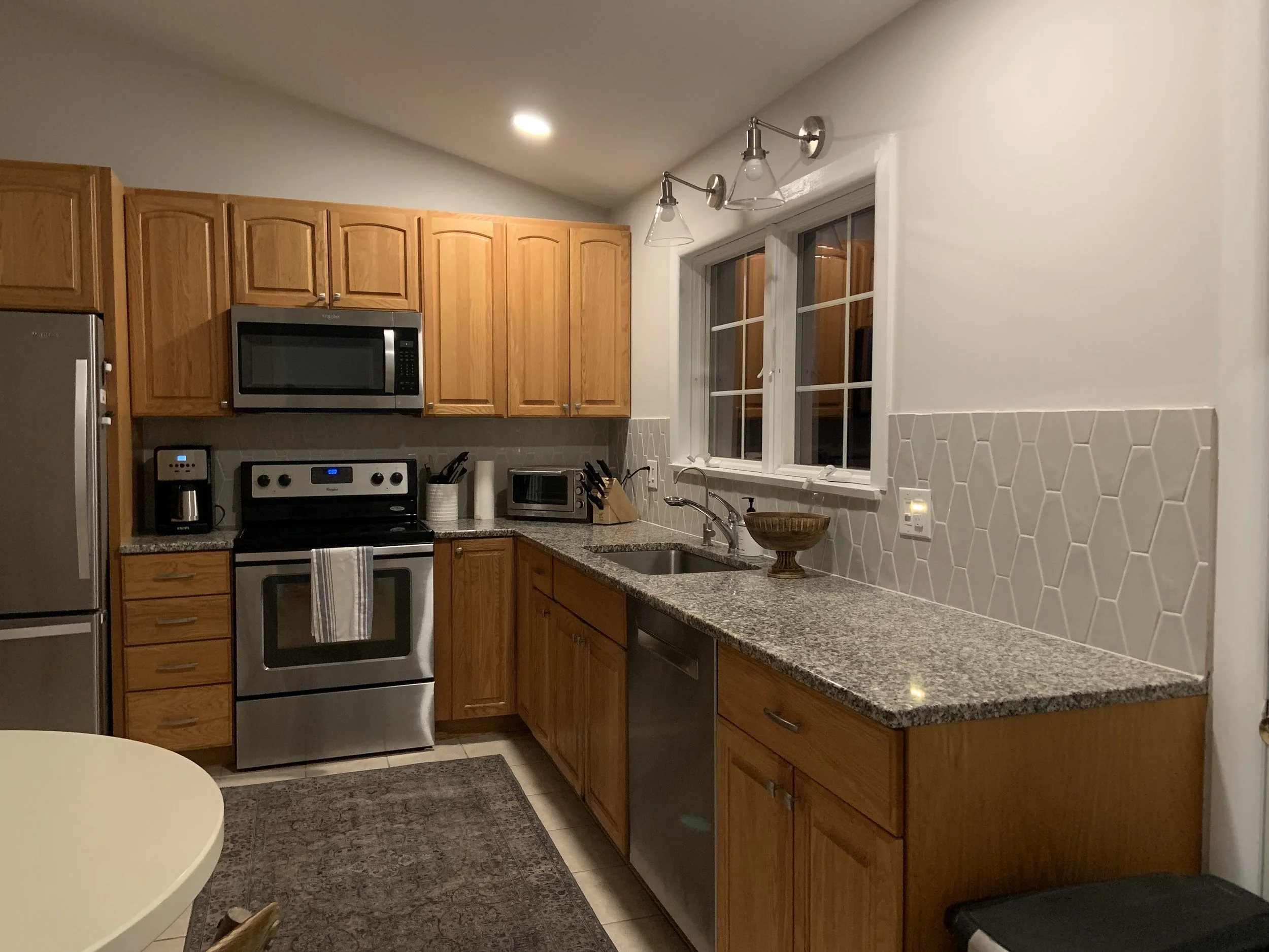 Kitchen backsplash with hexagon tile.